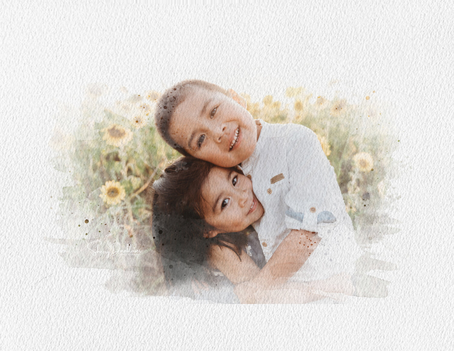 siblings in sunflower field hugging.jpg