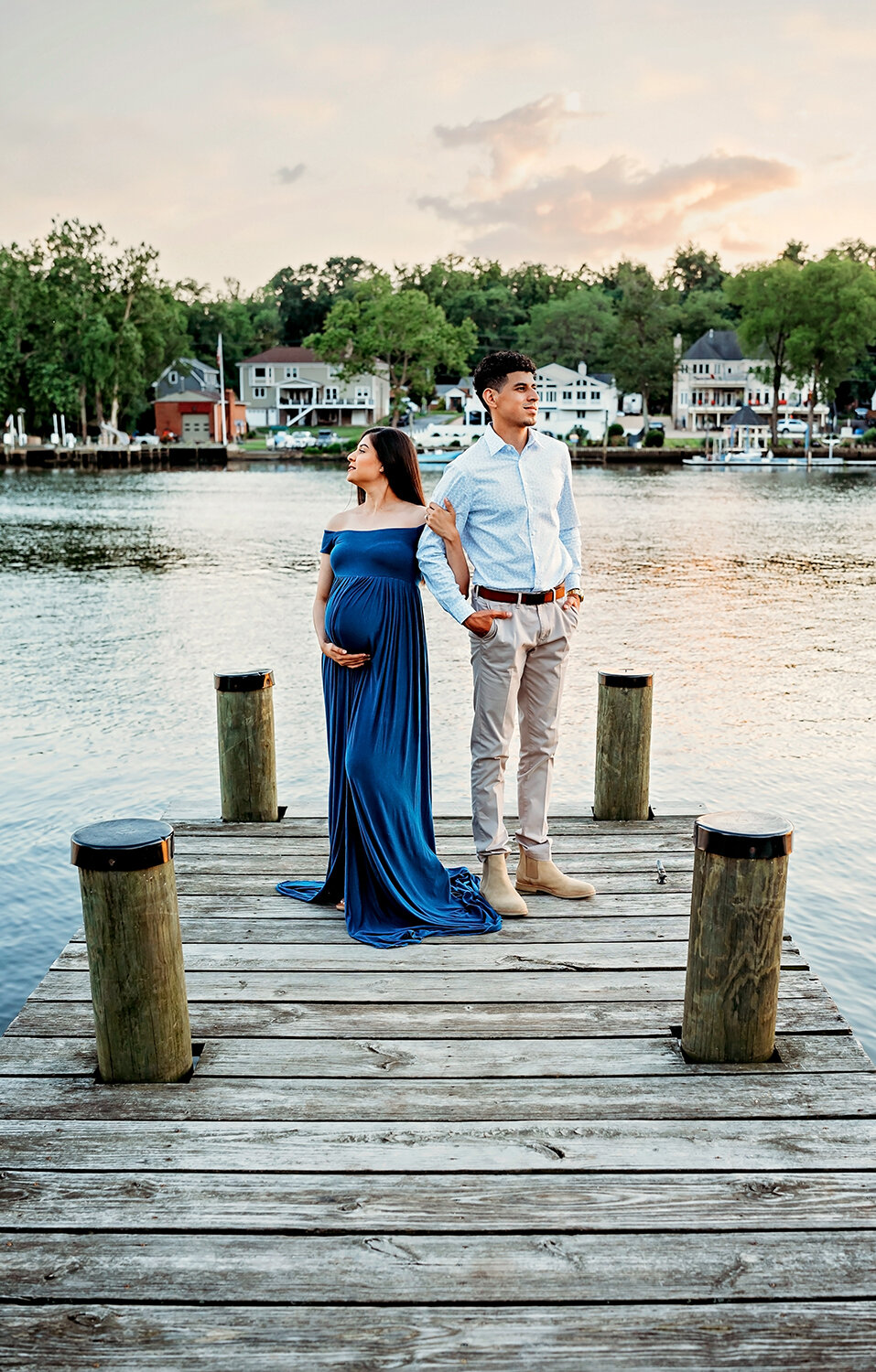 couple standing modern pose looking off in different directions.jpg