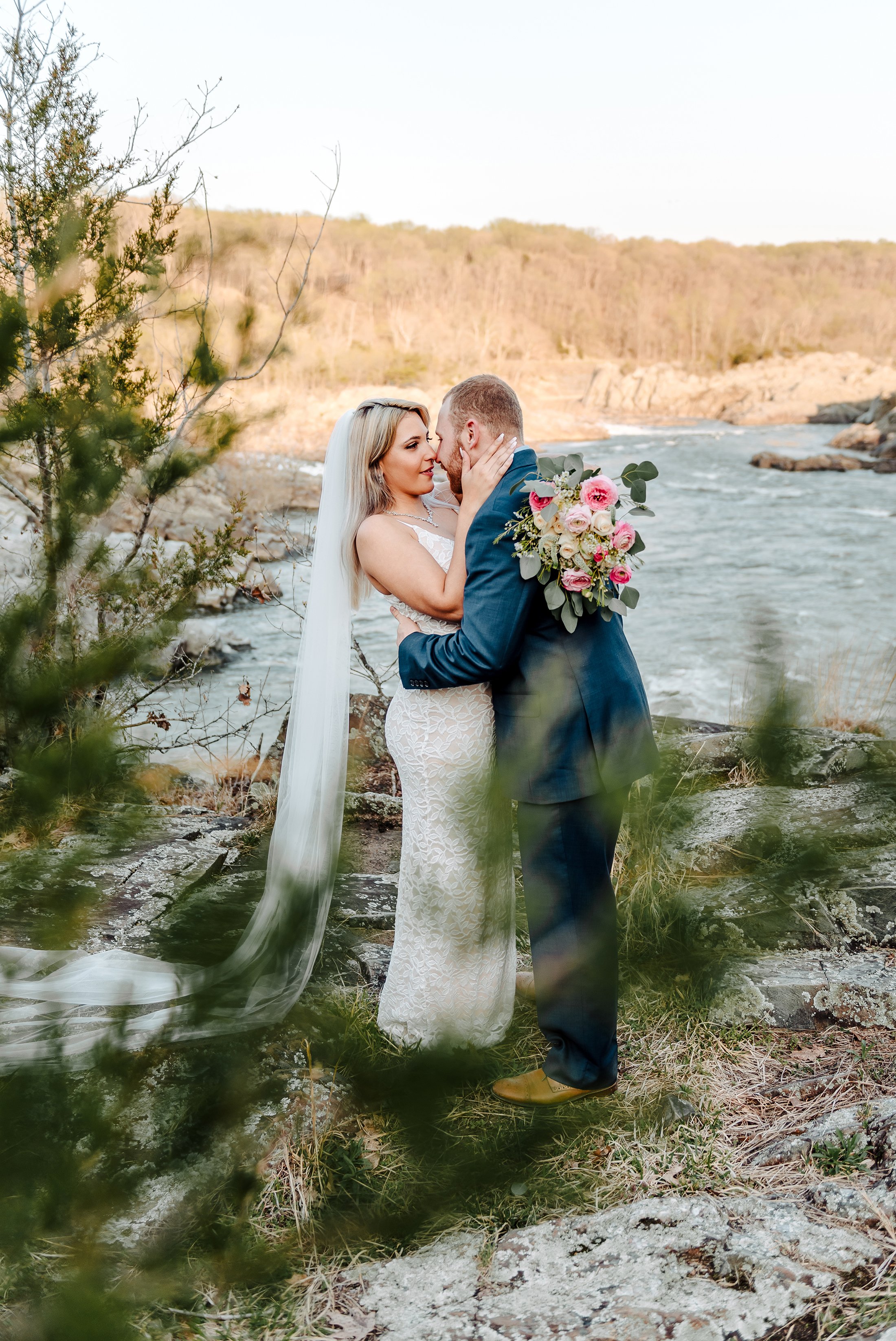 wife holding husbands face close to hers.jpg