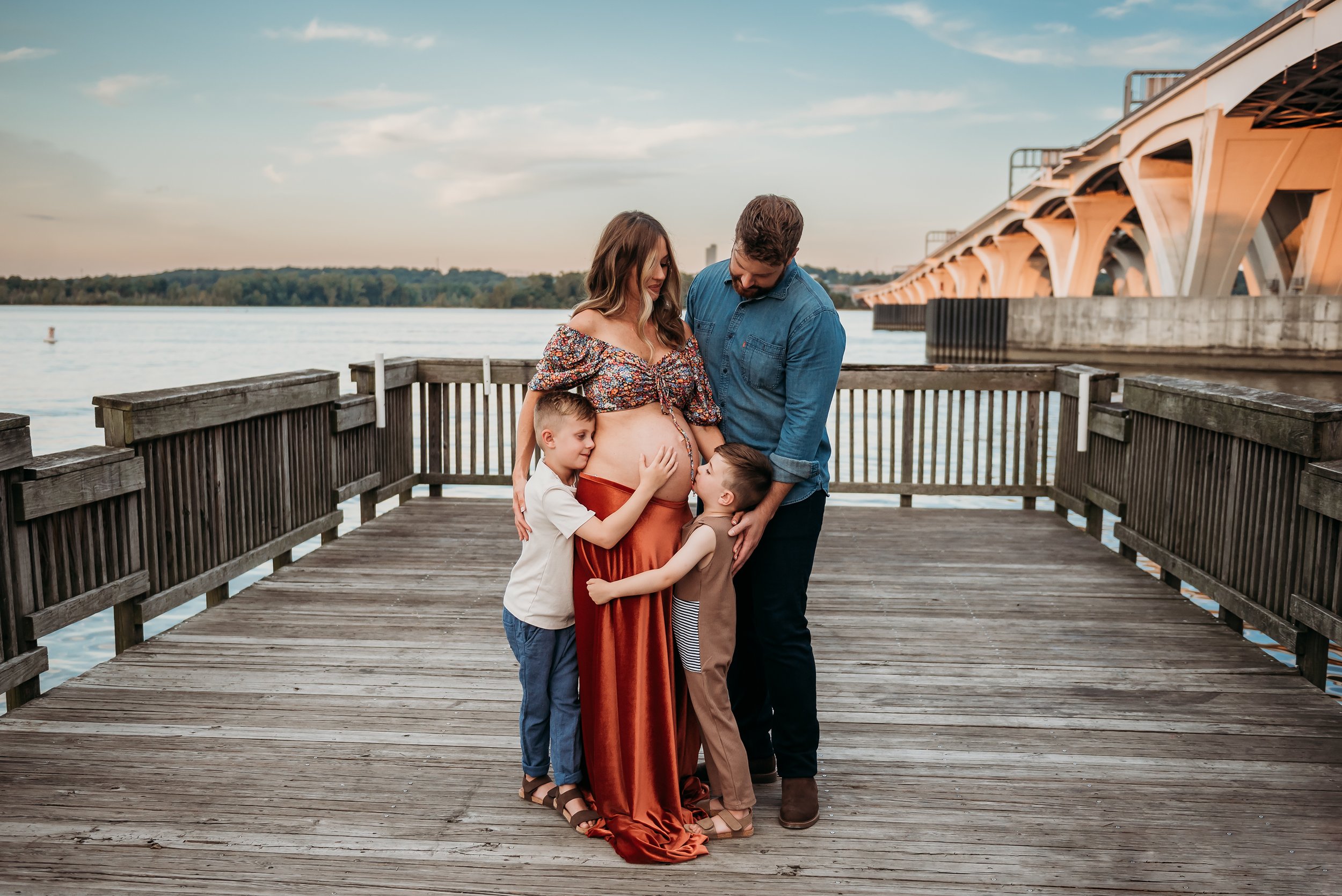 maternity session alexandria va mom with family on dock.jpg