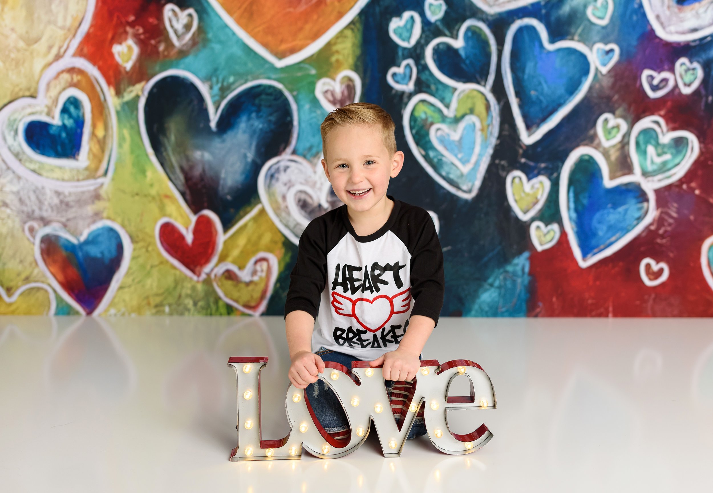 boy holding LED Love sign.jpg