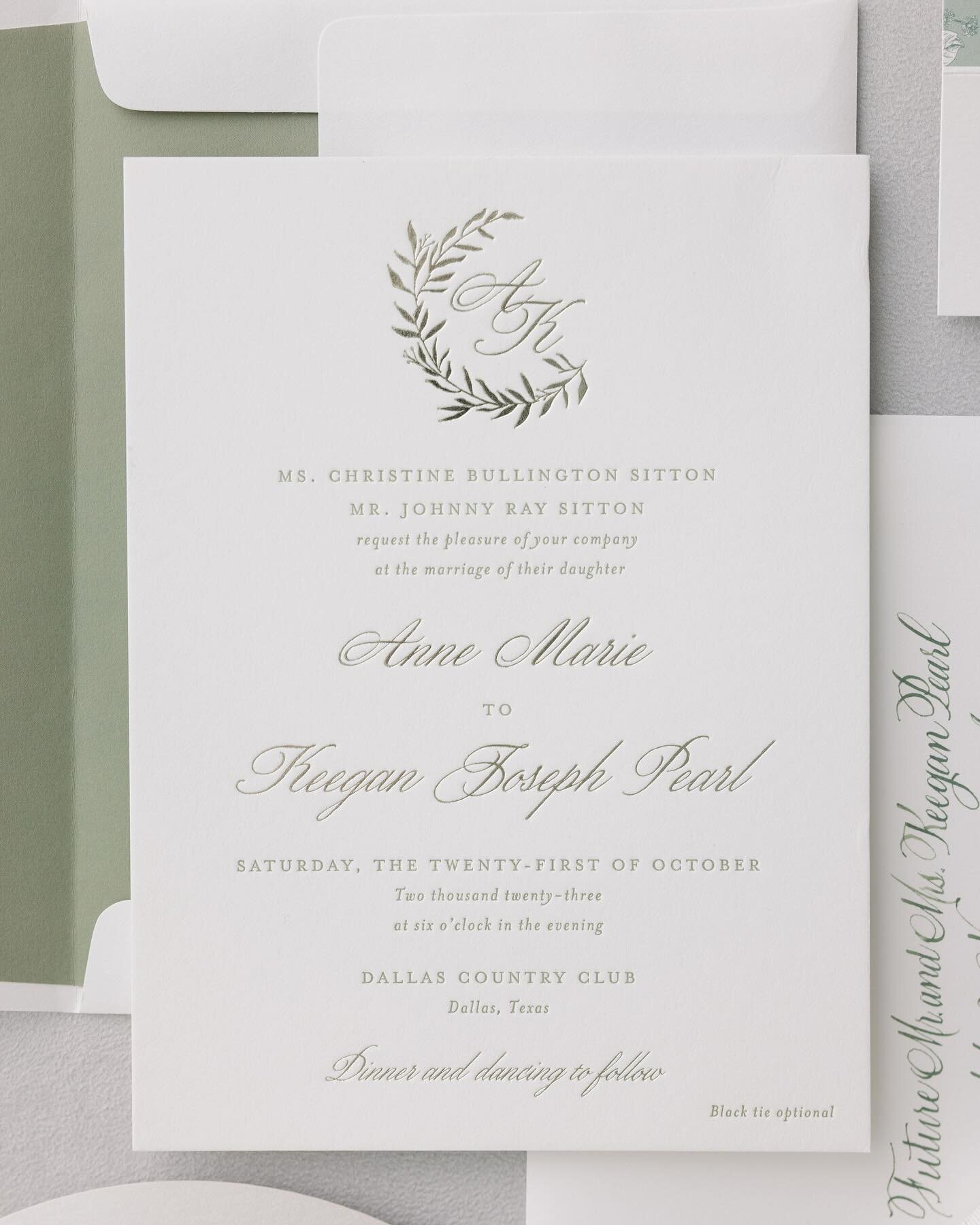Sage green letterpress and champagne foil set the tone for Anne-Marie and Keegan&rsquo;s gorgeous wedding at DCC. The color palette set the tone for the beautiful bridesmaids dresses and color palette. The monogram crest was carried out on their danc