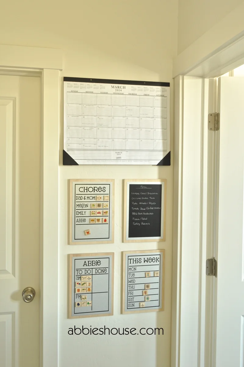 TO REMOVE THE HANGING STRIPS While pushing on the top of the strip, pull the tab on the bottom of the strip straight down slowly until it releases from the wall.