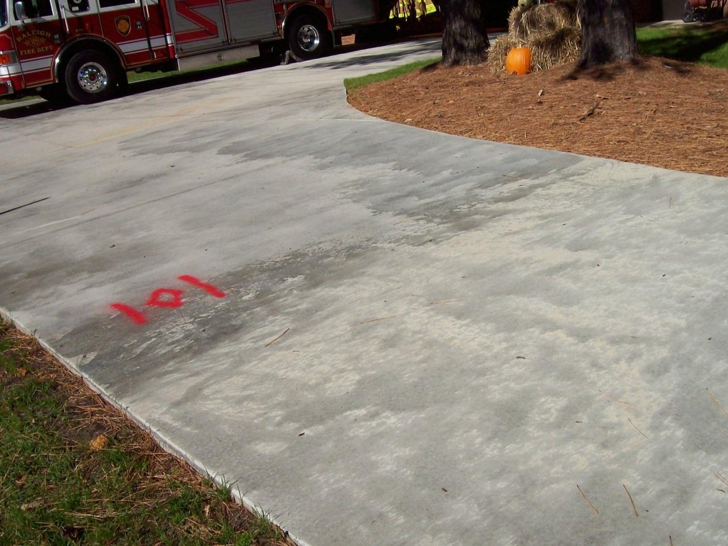 Freshly poured concrete at a Raleigh fire station driveway