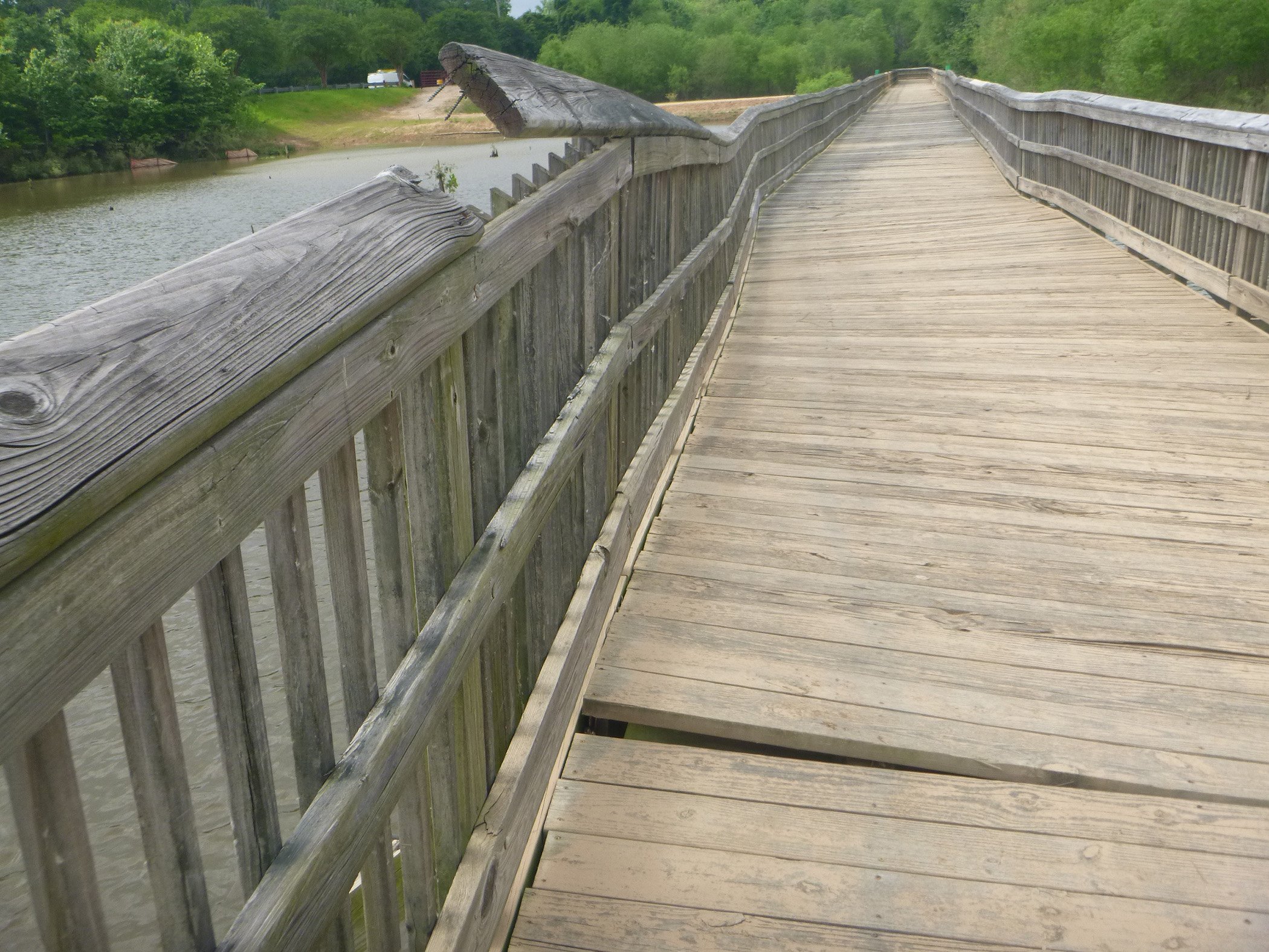 Another segment of the bridge having floated off the foundations