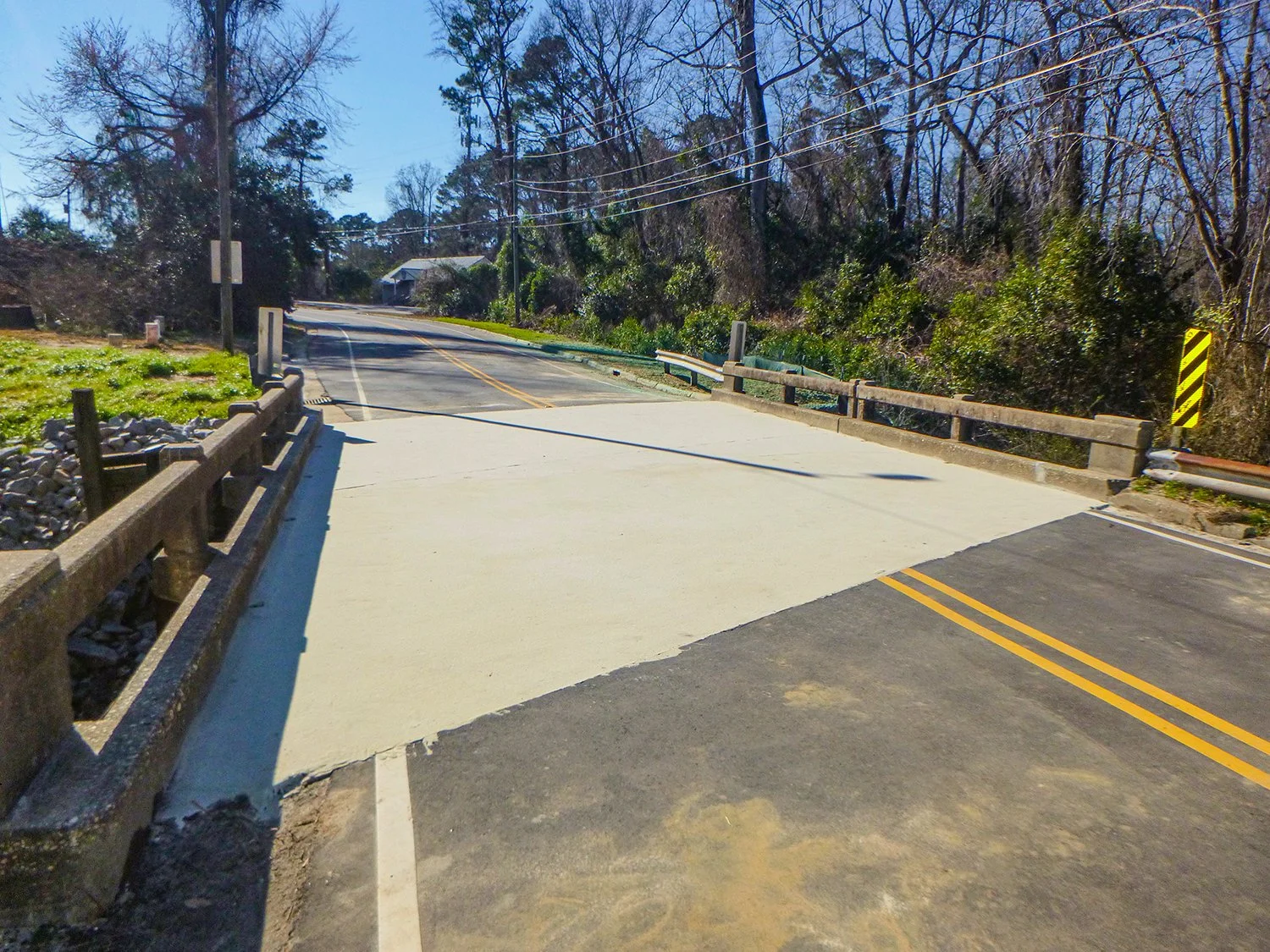 A roadway bridge wtih fresh concrete.