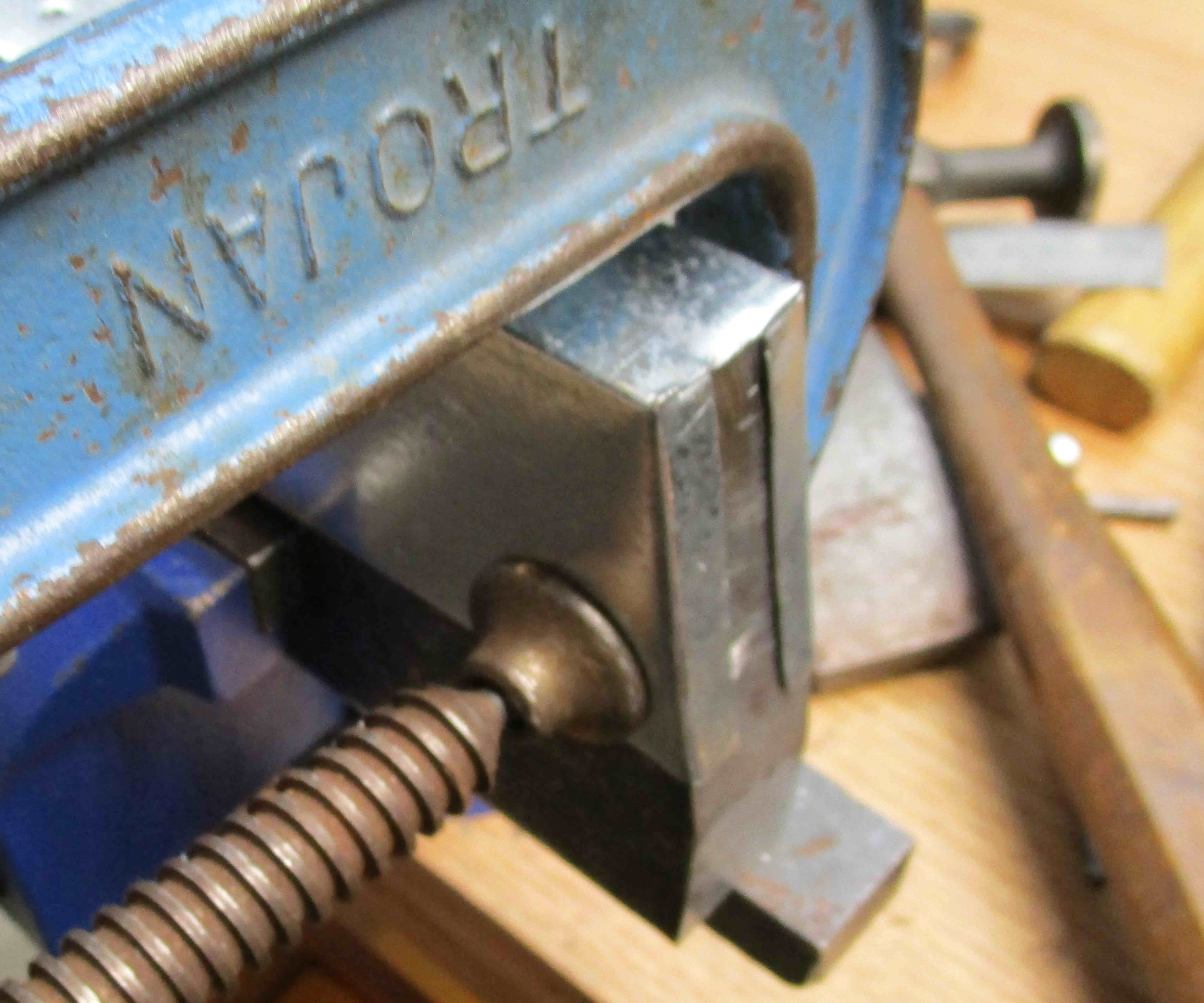 End forming, then trim edges and file to exact shape and profile