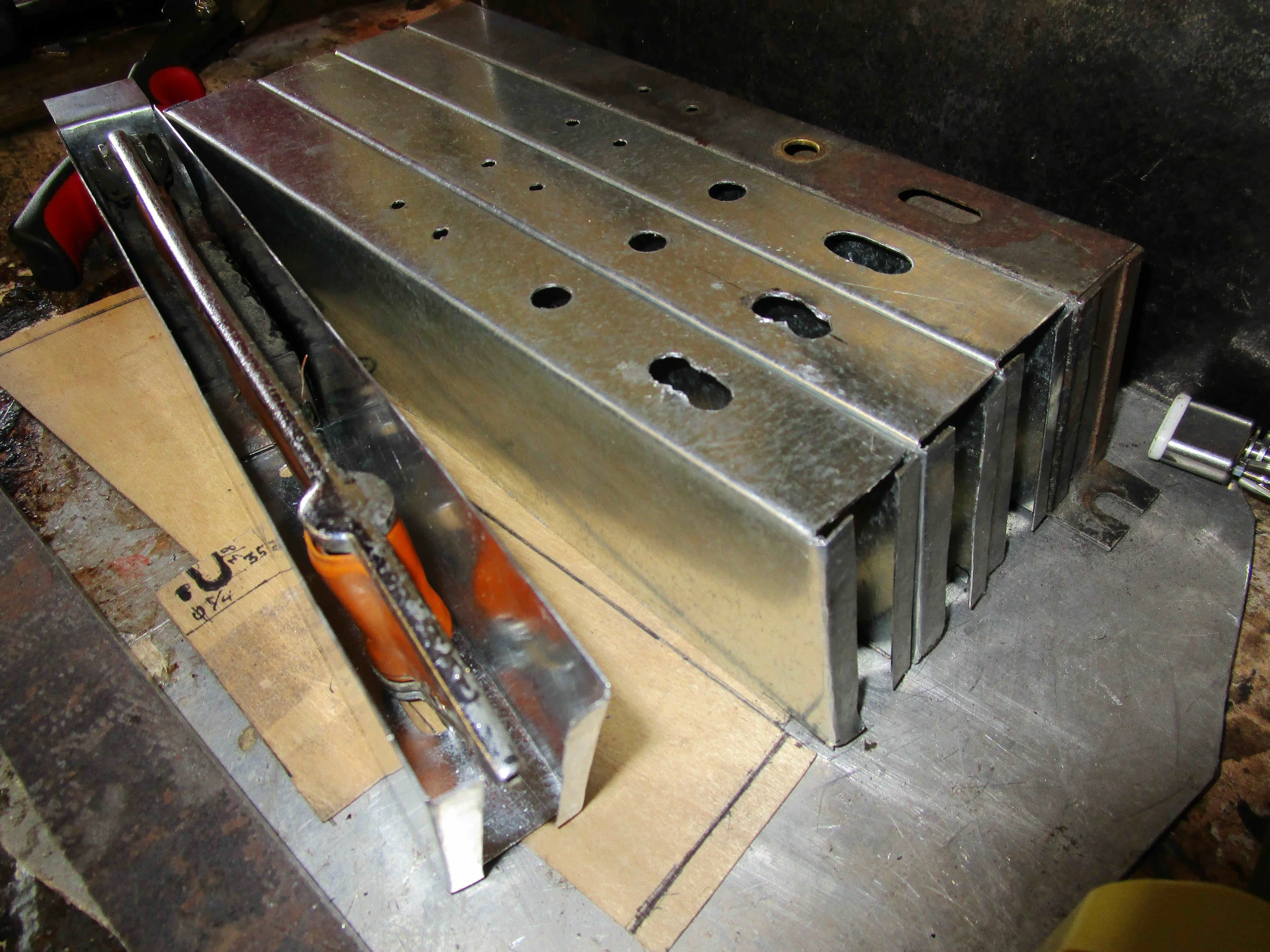 Box bodies ready for final finishing and spot welding of ends and solenoid tabs