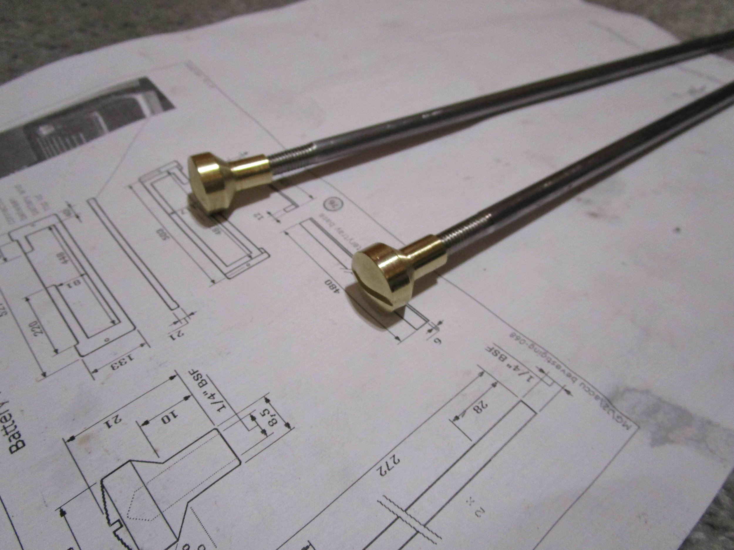 Long battery hold downs Pre-War MG Spring steel wire, machined brass, chrome plated (shown prior to chrome plating) . Threads cut 1/4" BSF 