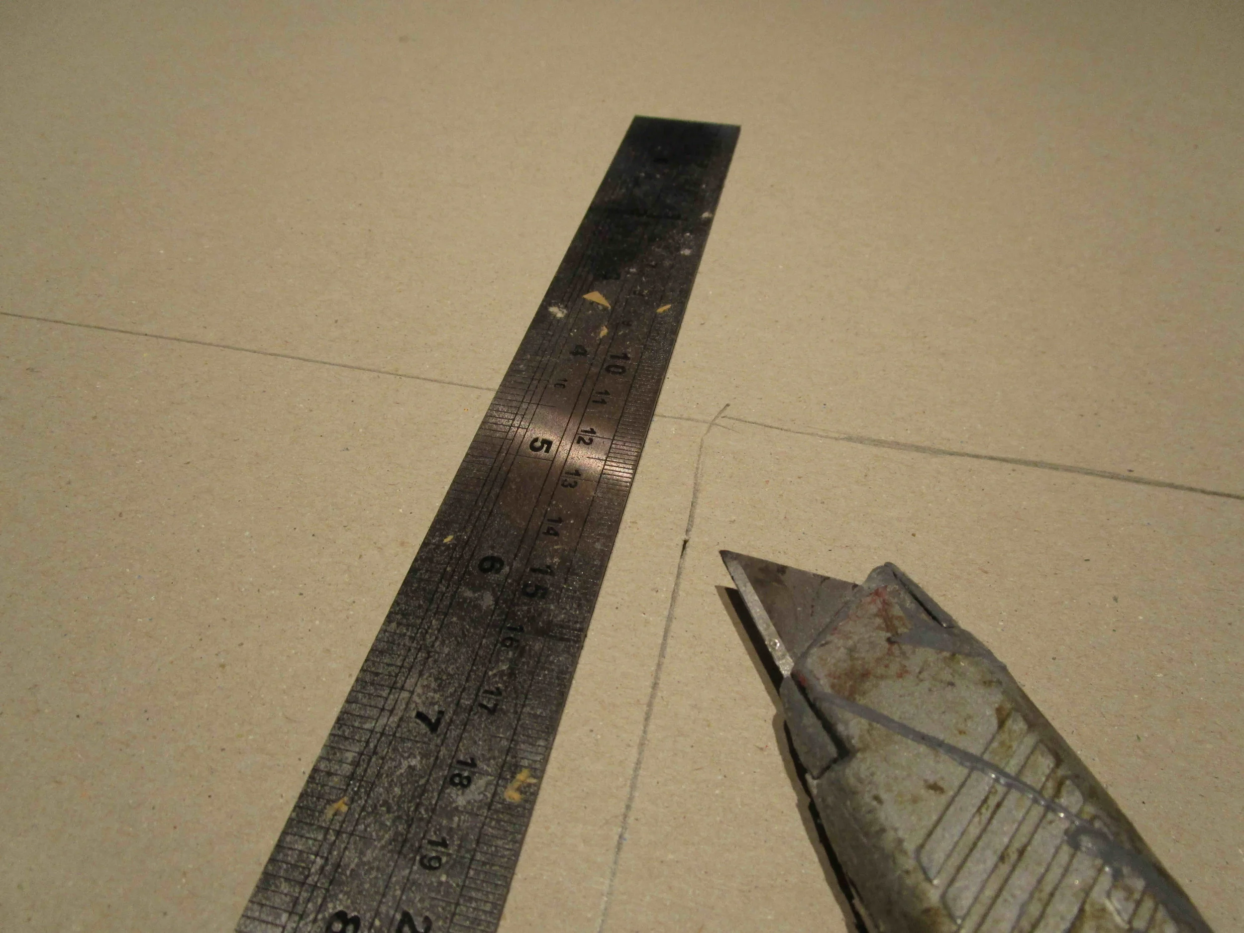 Mark cutting lines. Knife is a Stanley 10-299    