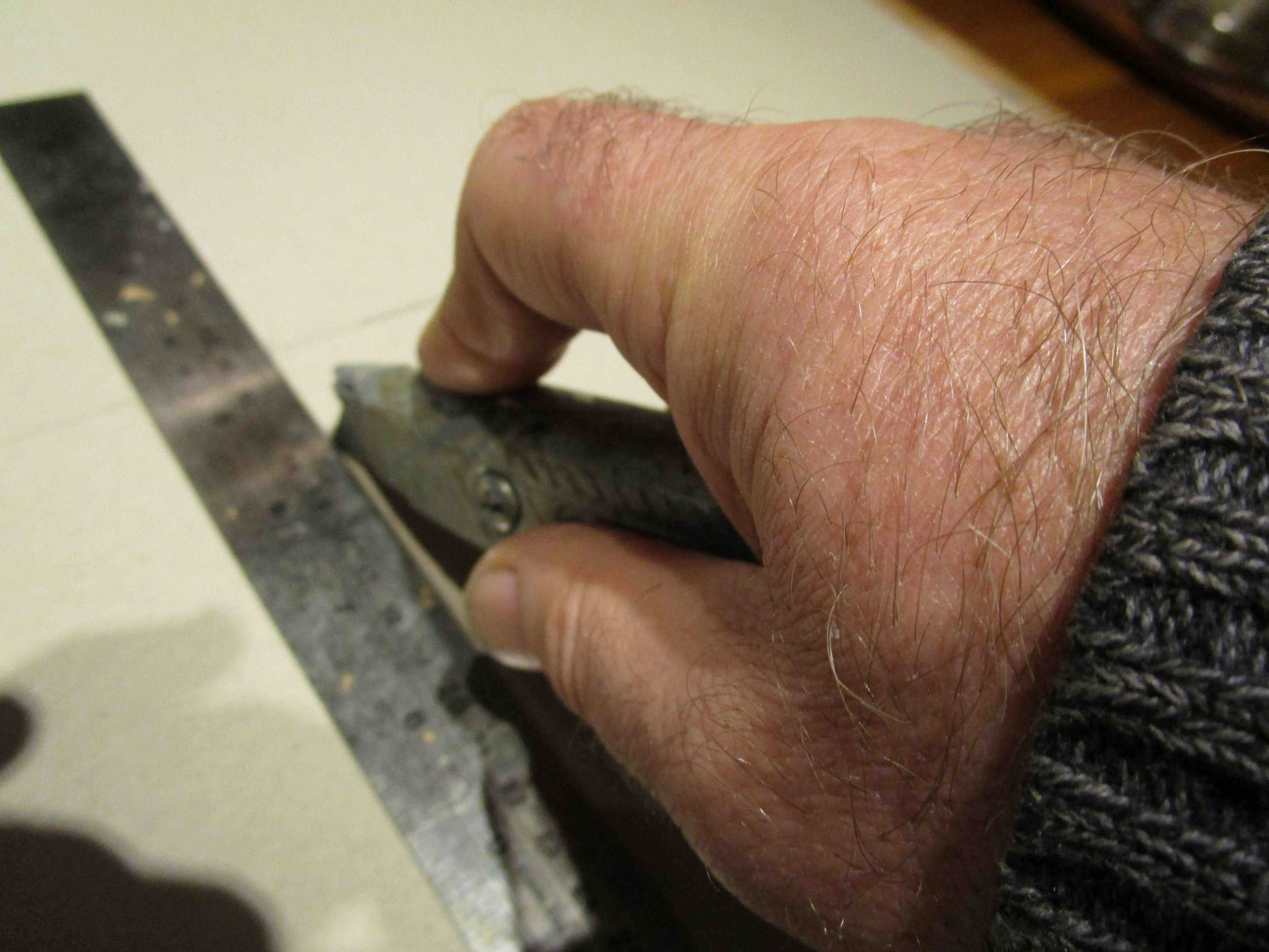 Cut on marks, keep non-cutting hand clear or clamp the steel ruler to be safe