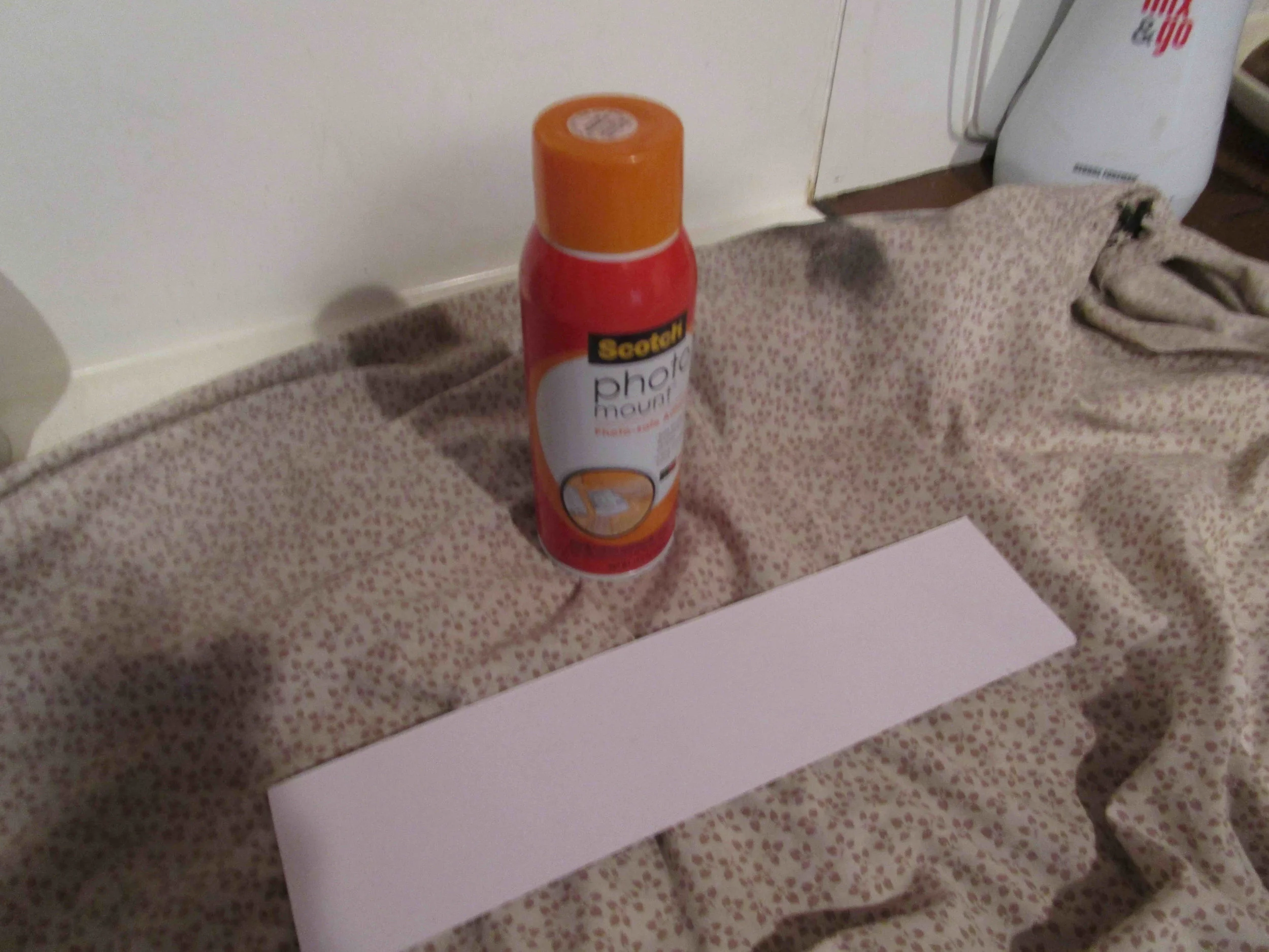 Photo glue, also use on large surfaces such as the top and bottom box linings