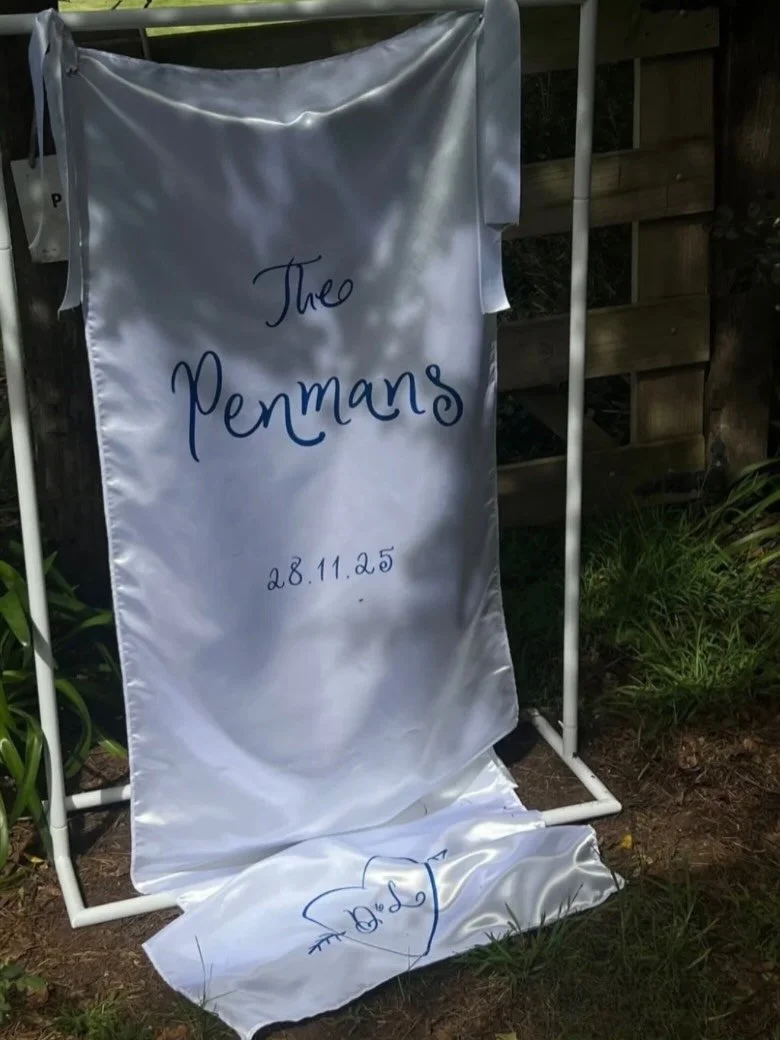 Aside from the florals; Signage and stationery details played a significant role in the overall styling for Laura and Darcy&rsquo;s day.

Modern mirrored finishes paired with soft satins and ribbon place cards.
Crisp linens and sweeping textured napk