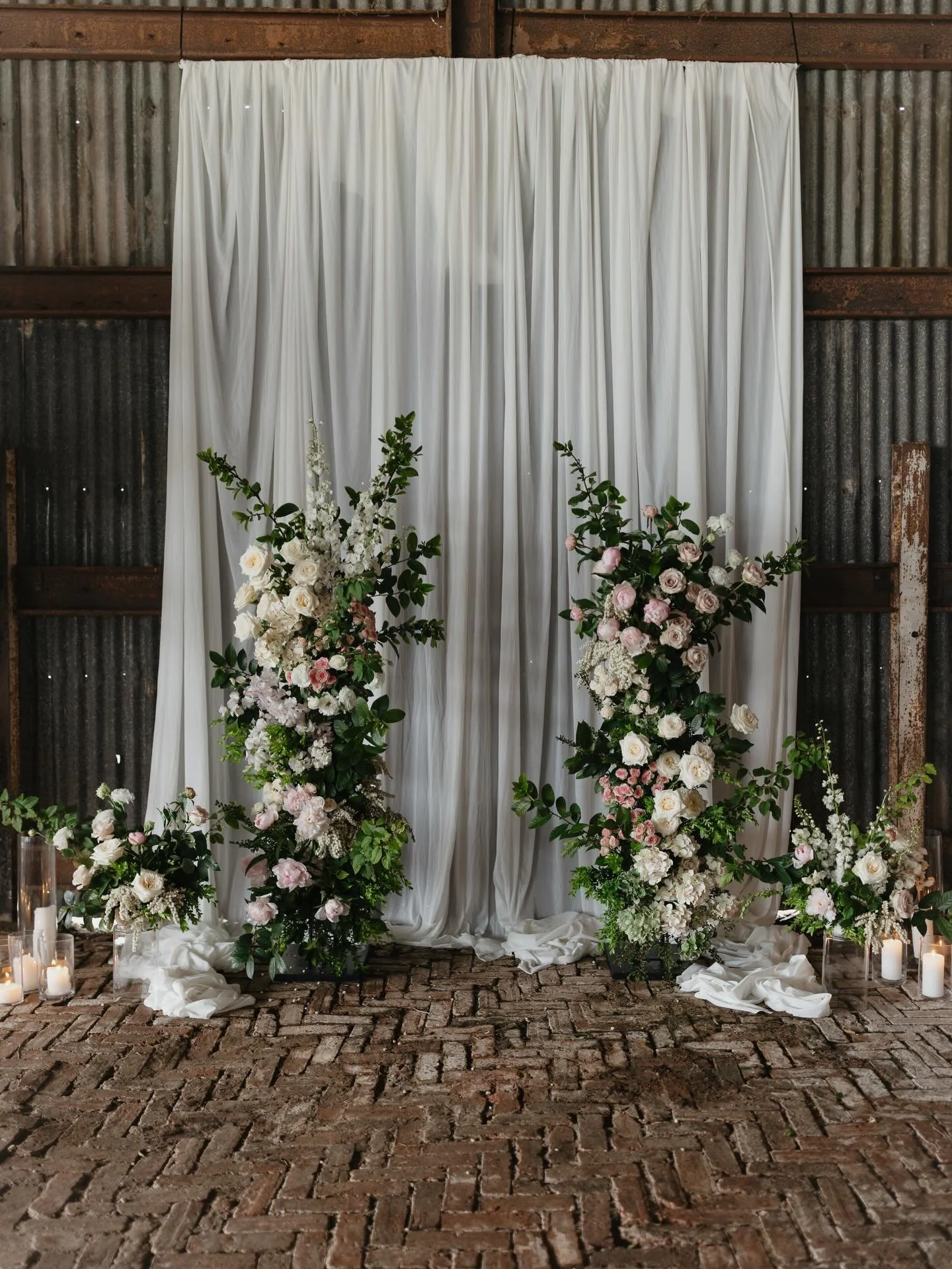 When the weather has other plans, add more candle light.
Megan and Jason embracing the rain meant their ceremony only felt more romantic.

@morganleephotography_ 
@megan.clemm 
@mewburnpark 
@eviewilson_celebrant 
@benita.tscharke.floral 
@djnige_