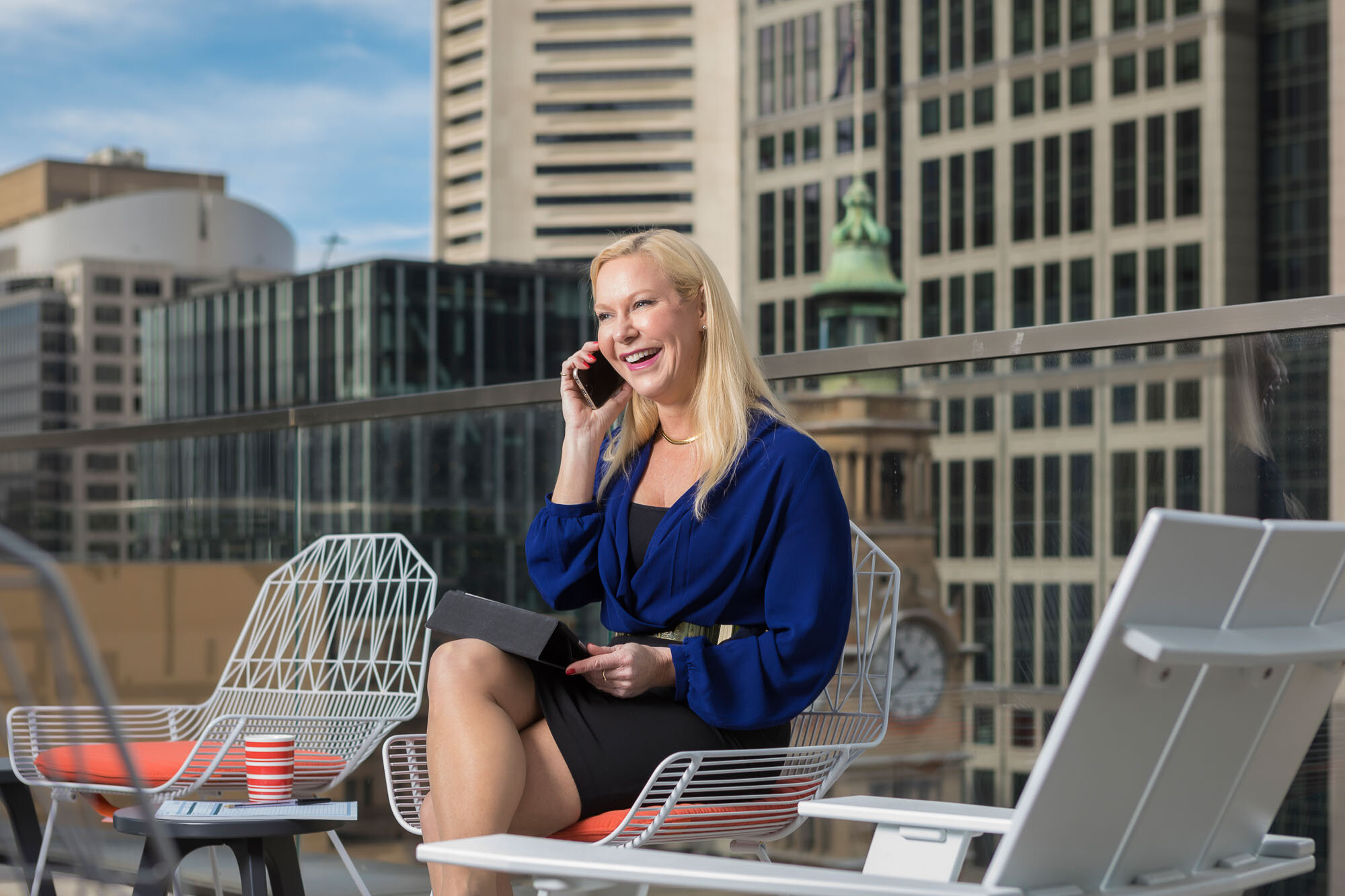 people-work-portrait-female-ceo-working-office-rooftop-cityscape-sydney