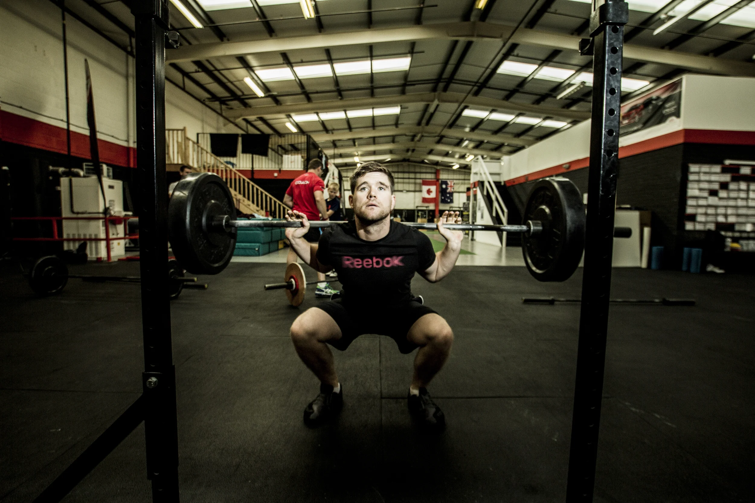 CrossFit class Bedford squat with Barbell