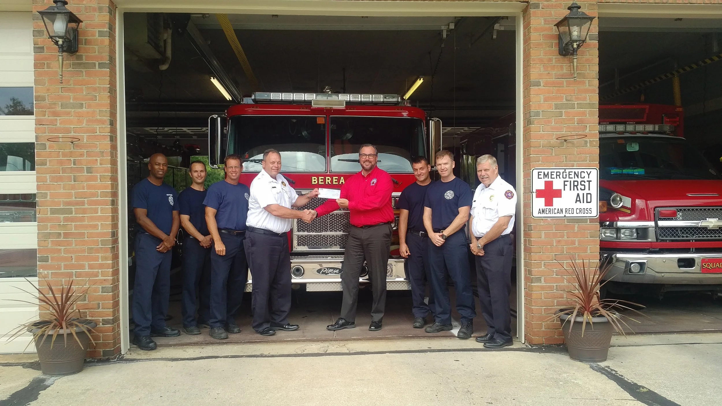 Pictured from left to right, Lt. Williams Phelps, Sr. Firefighter Adam Labuda, Sr. Firefighter Jon West, Chief Mark Kaufhold, Exalted Ruler Richard Threadgill, Sr. Firefighter Mike Kubec, Sr. Firefighter Pat McCarthy, Lt. Tom Emling—Fire Marshall.