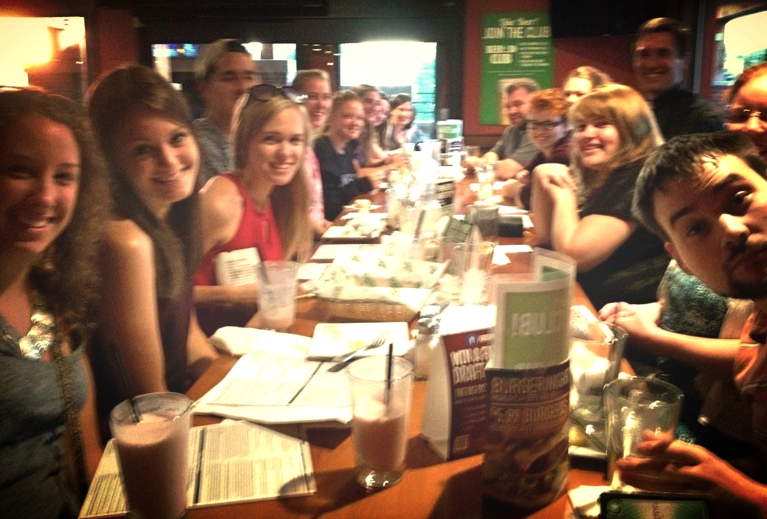  Fr. Craig Timmerman at Green Mill with young adults at "Truth on Tap" in New Ulm. 