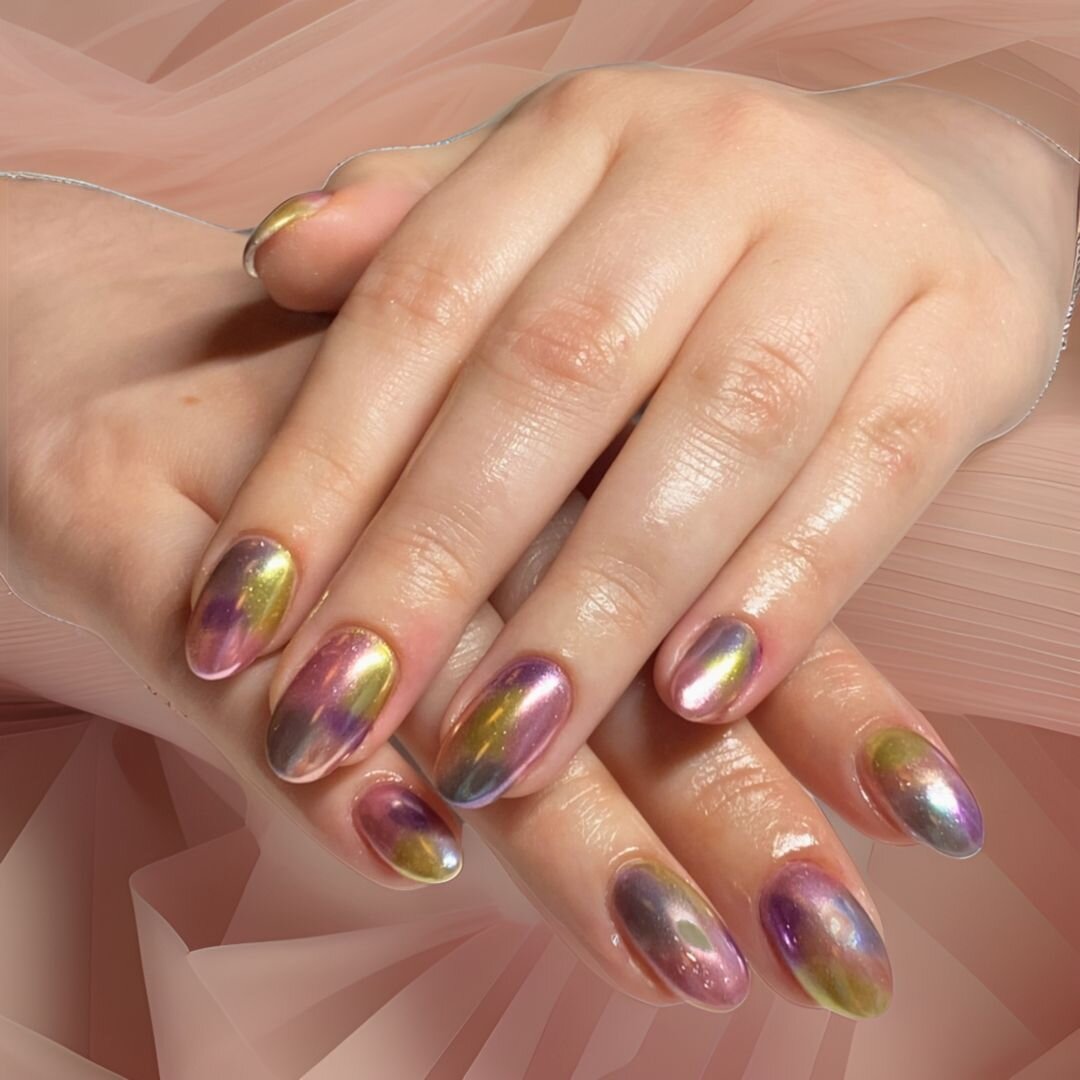 A kaleidoscope of spring hues 💅🌈 This gel manicure,  with multicolor Chrome nail art by #AlissaatPoppy, is truly one of a kind 🤩

#SpringNails #ColorfulManicure #ChromeNails #NailArtistry #NailInspiration #PoppySalon #NailGoals #SpringVibes #NailD