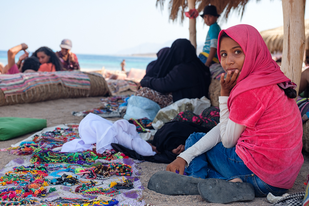 "Did you make all of these braclets yourself?" "Yes, my mother and I make them to help the family."