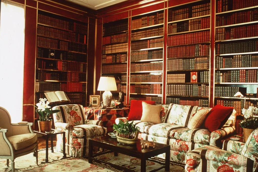 In this room, Albert Hadley kept the chintz in the library that Sister Parish designed for Brooke Astor's apartment on Park Avenue, but he tore out the walls and put in brass-fitted bookshelves.