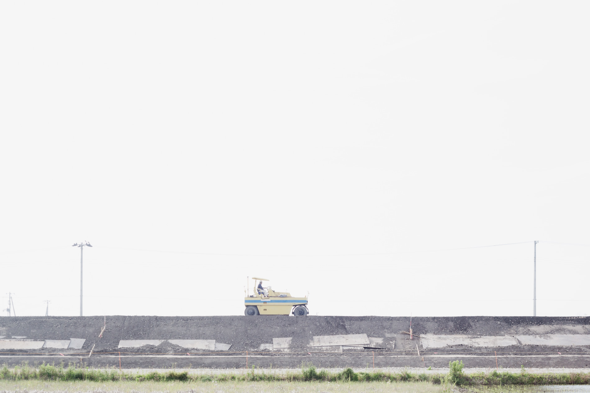 Title: In transition #18 (reinforcing the seawall)