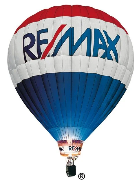 RE/MAX-branded red, white, and blue hot air balloon