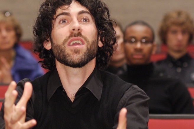 Alan Reinhardt teaches during a master class while on tour.