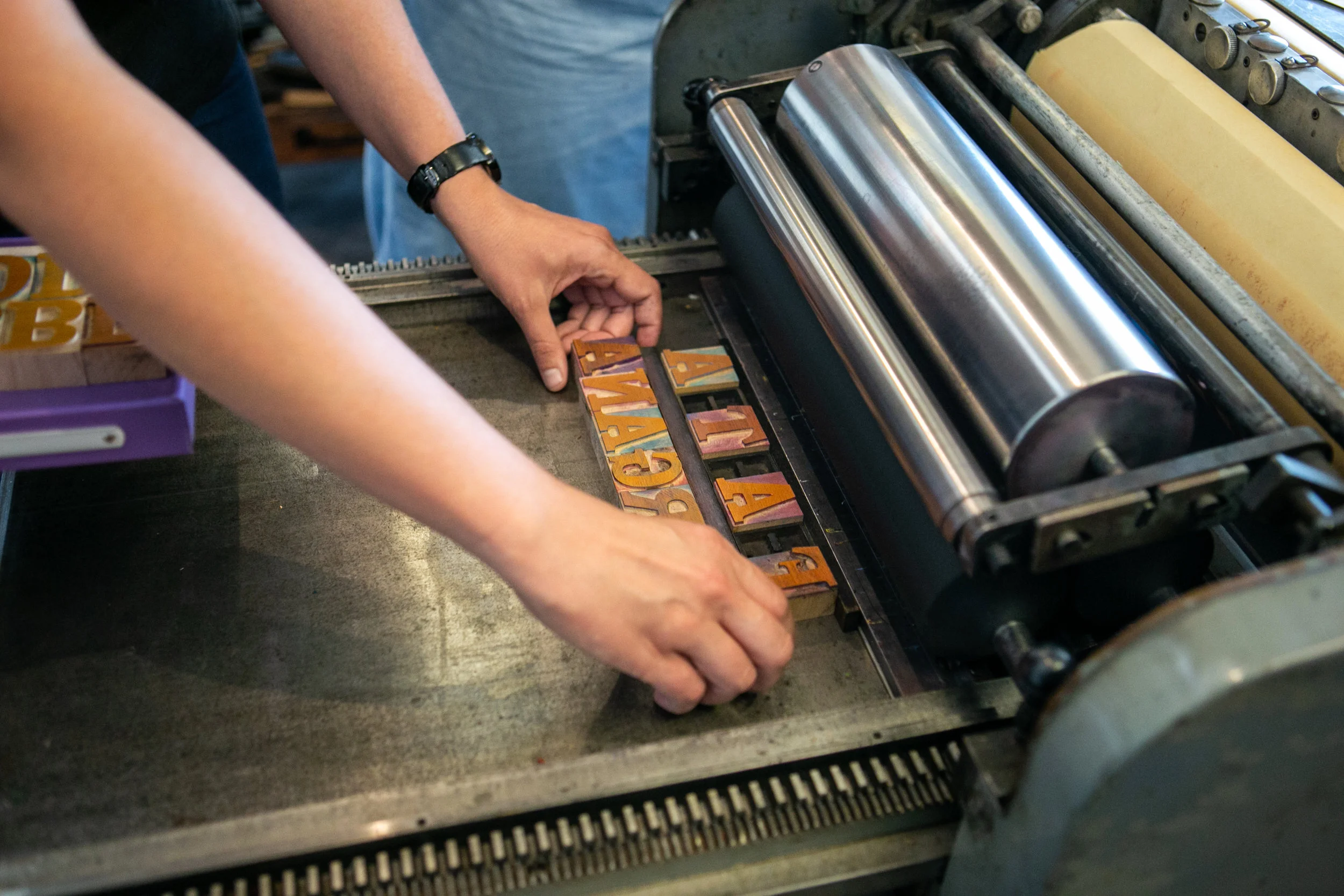 Wood and Metal type on press