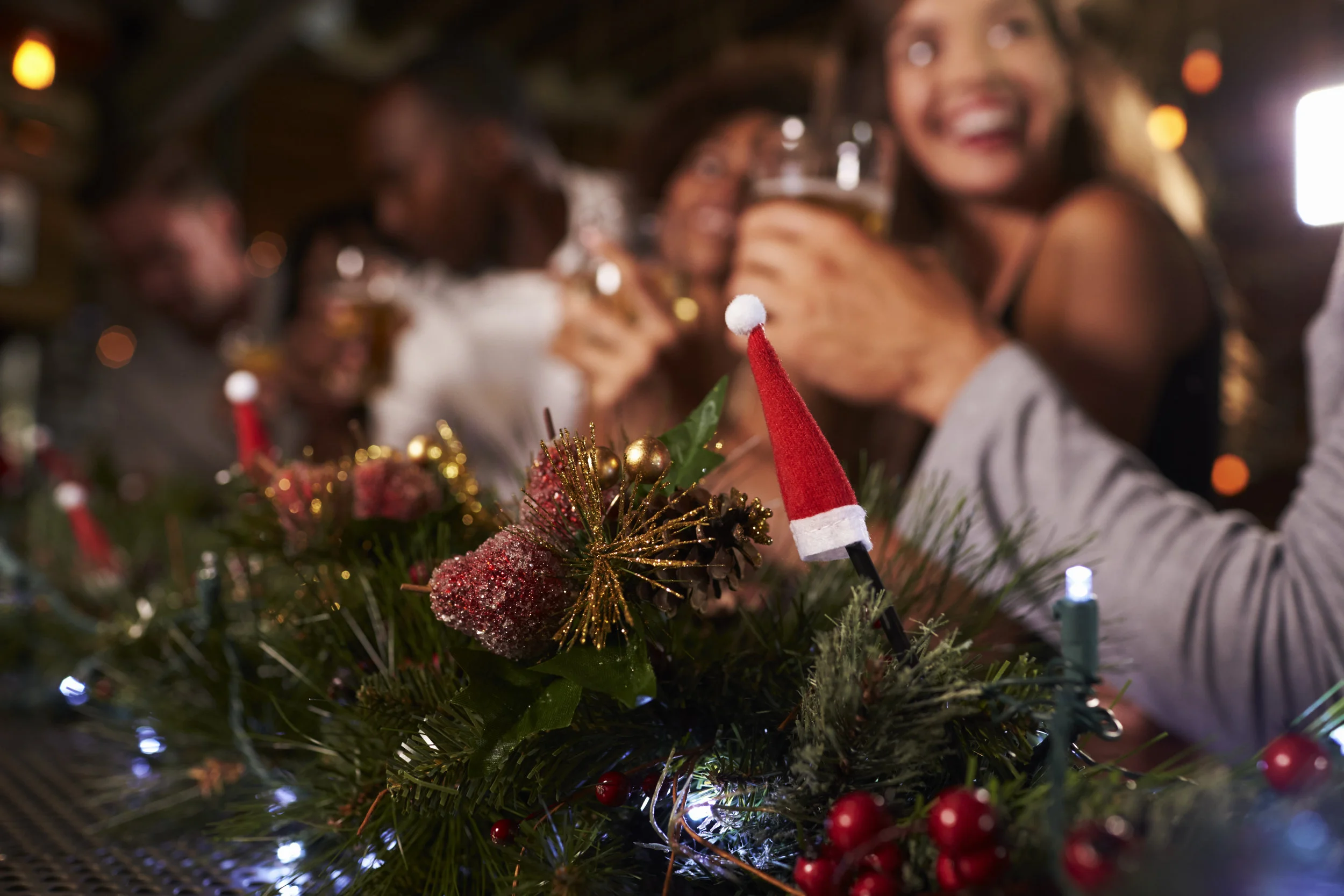 christmas-party-at-a-bar-focus-on-foreground-PLDAF4C.jpg