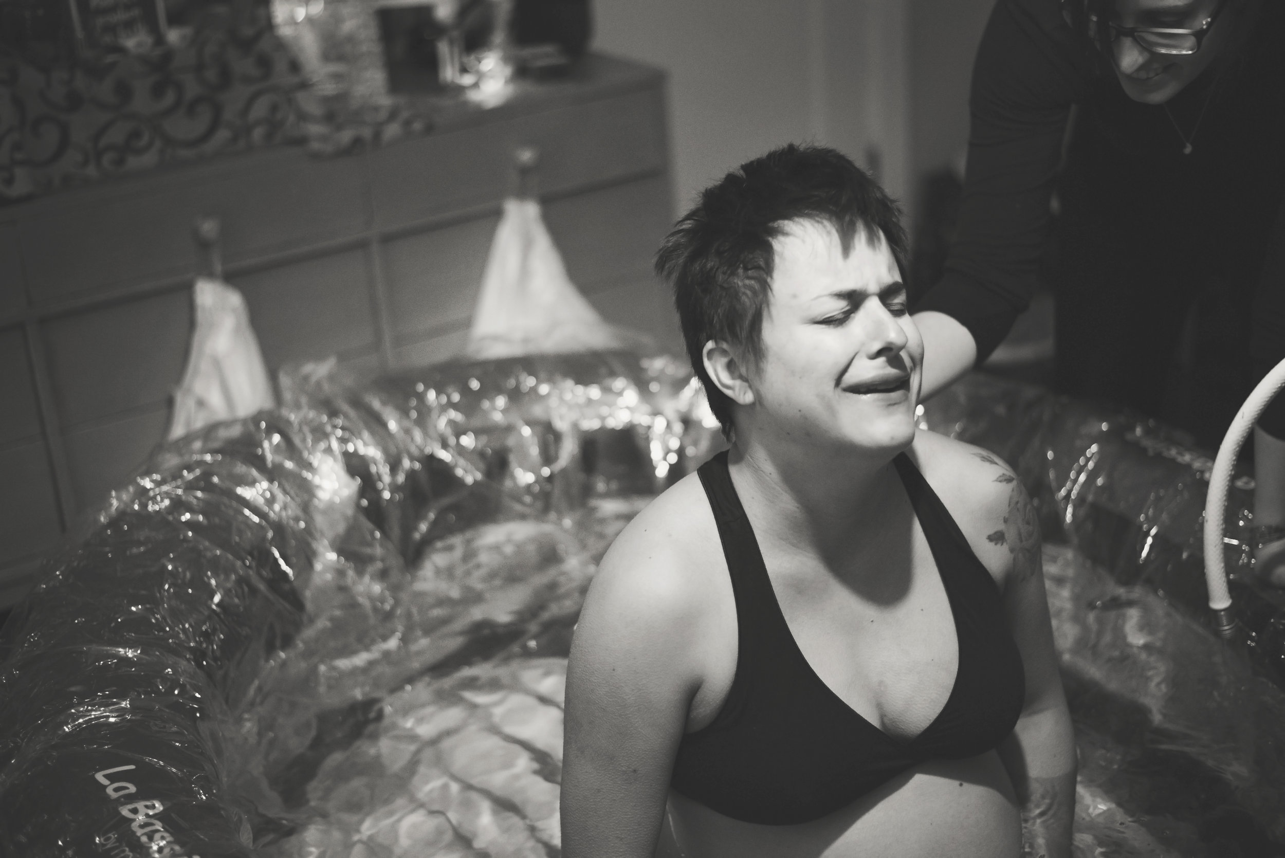 Crying with relief when I got into the birth tub. "Can I just stay in here for the rest of my life?!"