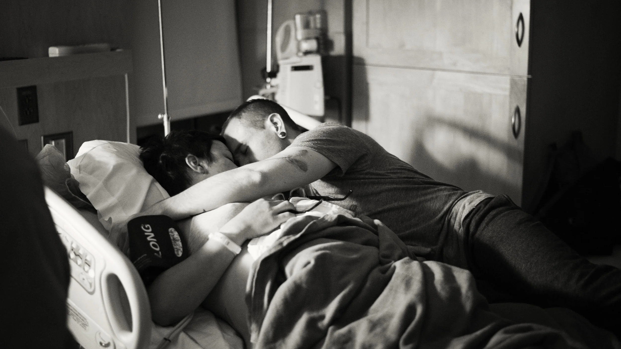 Cuddling after the c-section, getting support and love from Spencer. 