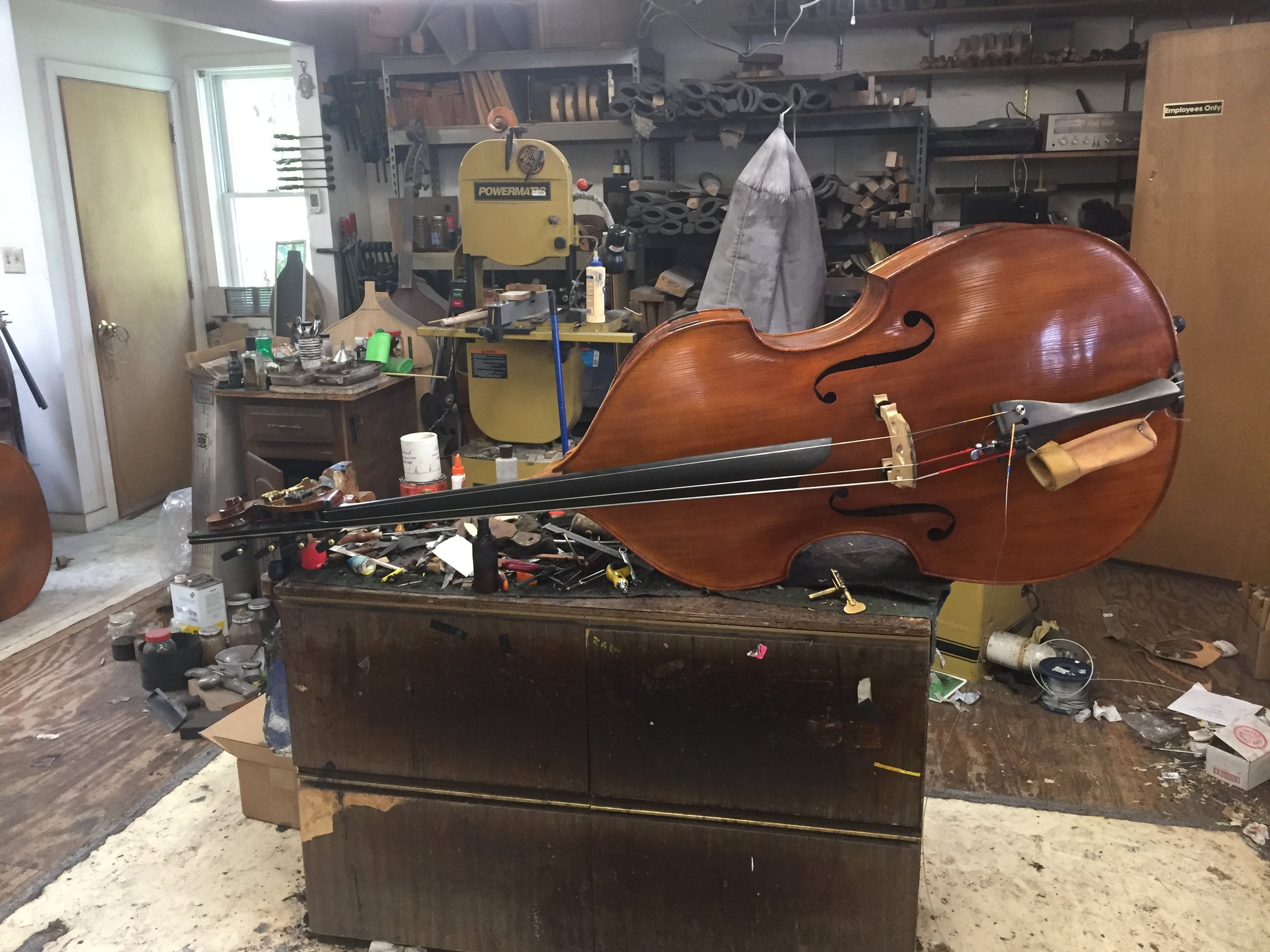 on the workbench at Shank Strings