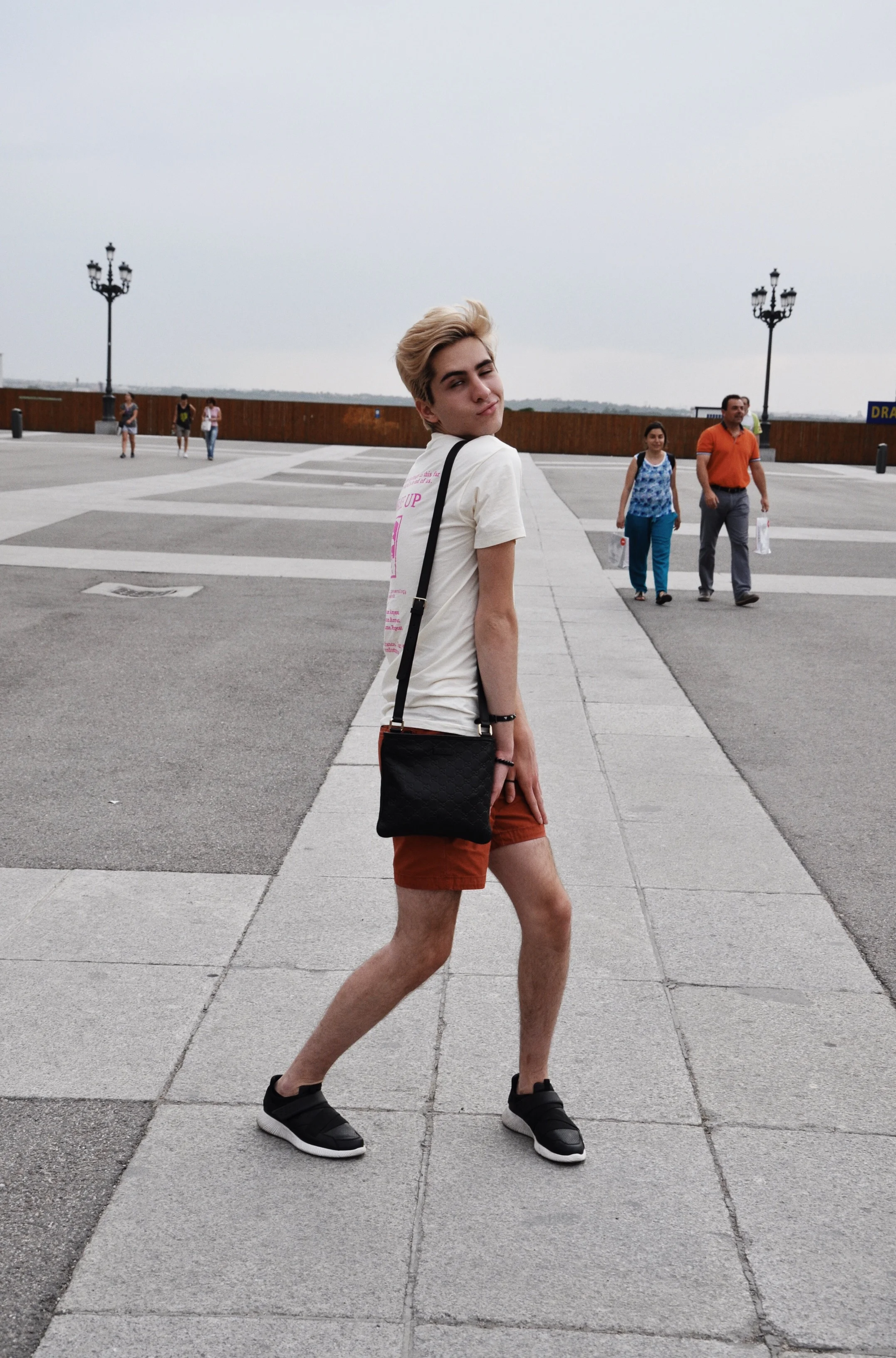 Silliness outside the Palace. Sneakers : Zara & Messenger Bag : Gucci