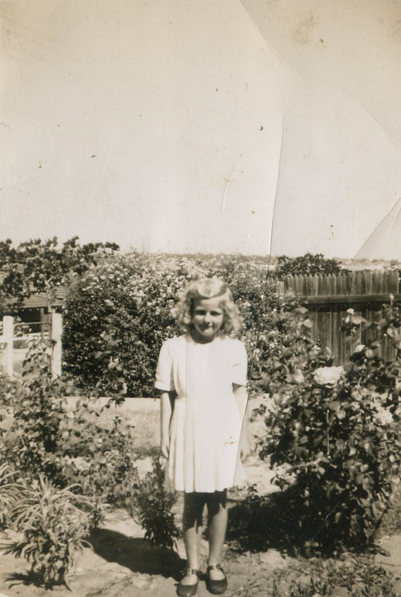  1945 - Dorothea in the back yard of their home at 63 McKenzie Street, Wembley. Her brother Leo came home from the war that day! 