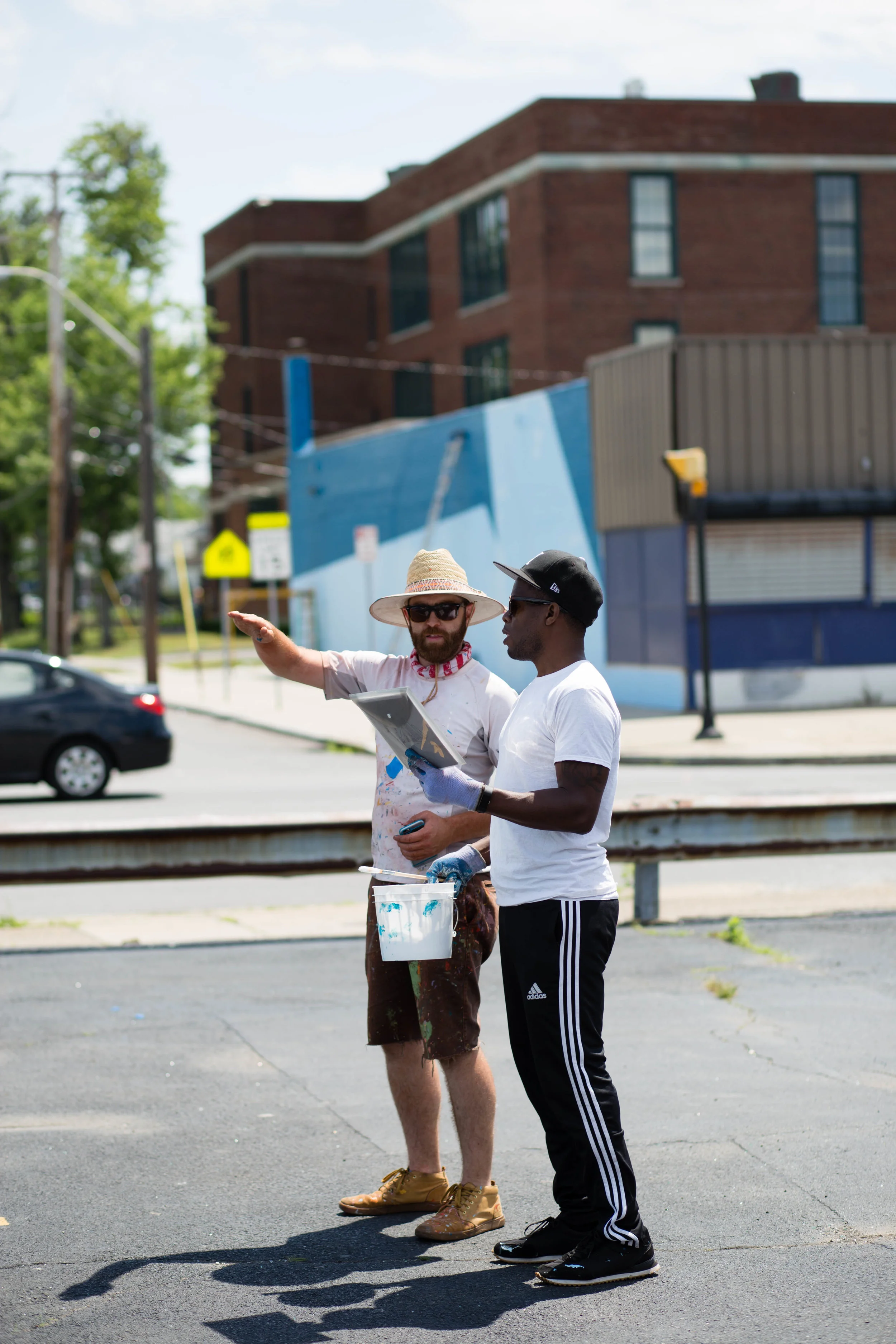 Artists Nick Miller and Edreys Wajed planning out the next steps.