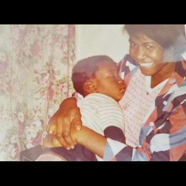 This is George Floyd as a child, with his mom.