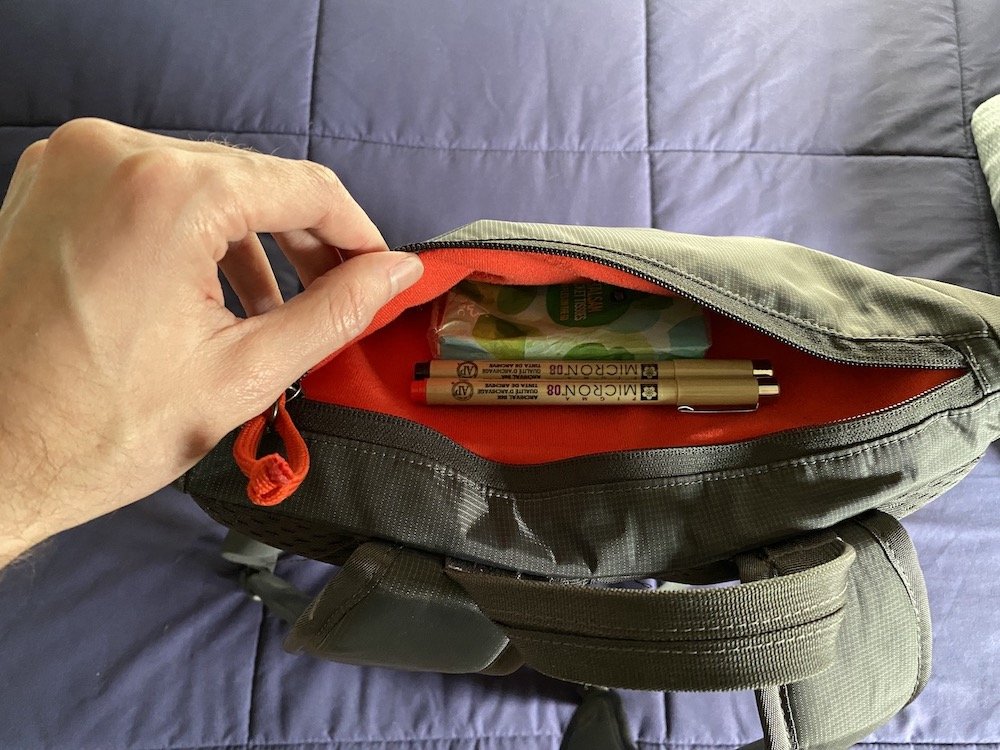  The small pocket on the top flap is great for pens, your favorite cable, hand sanitizer, and chapstick. 