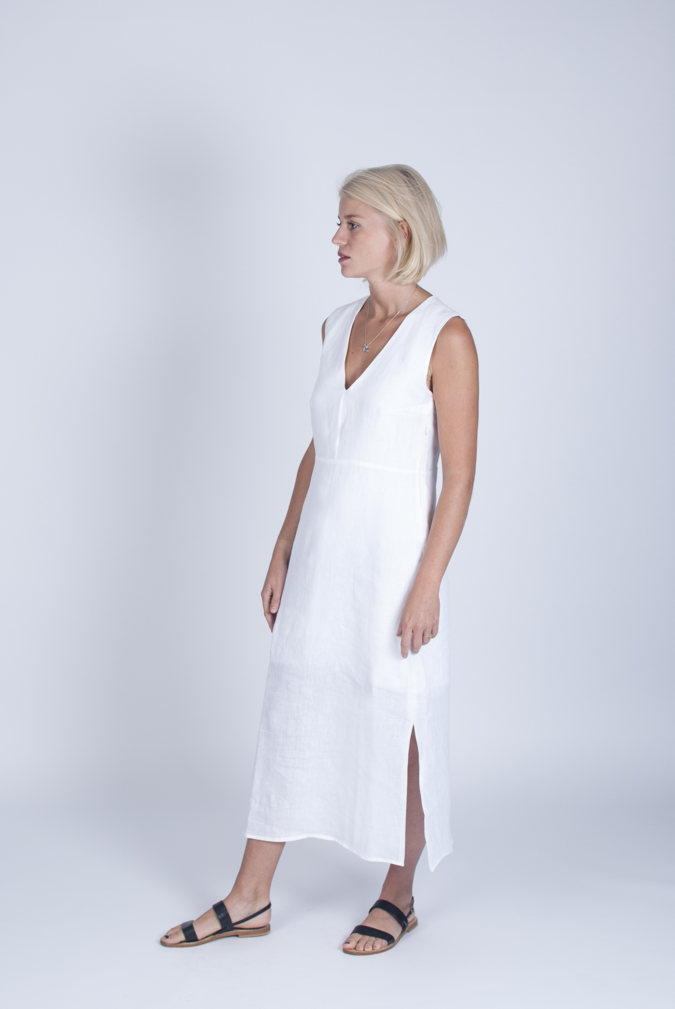 Pared-back midi dress in white.