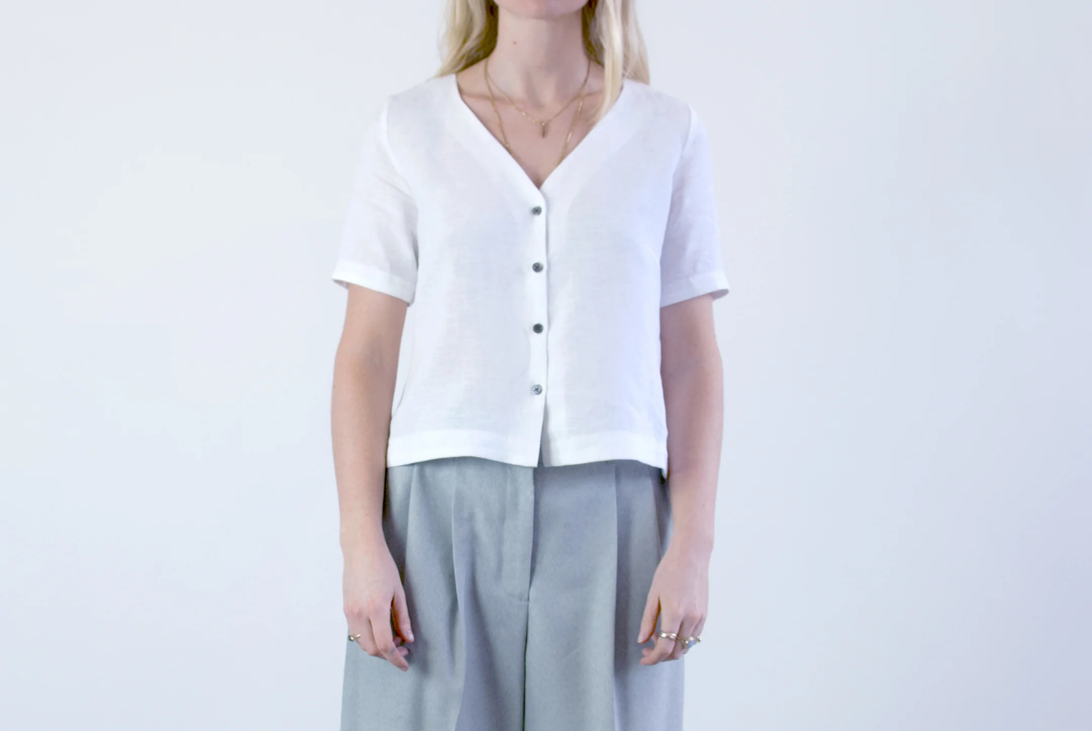 Pearl buttons on linen shirt