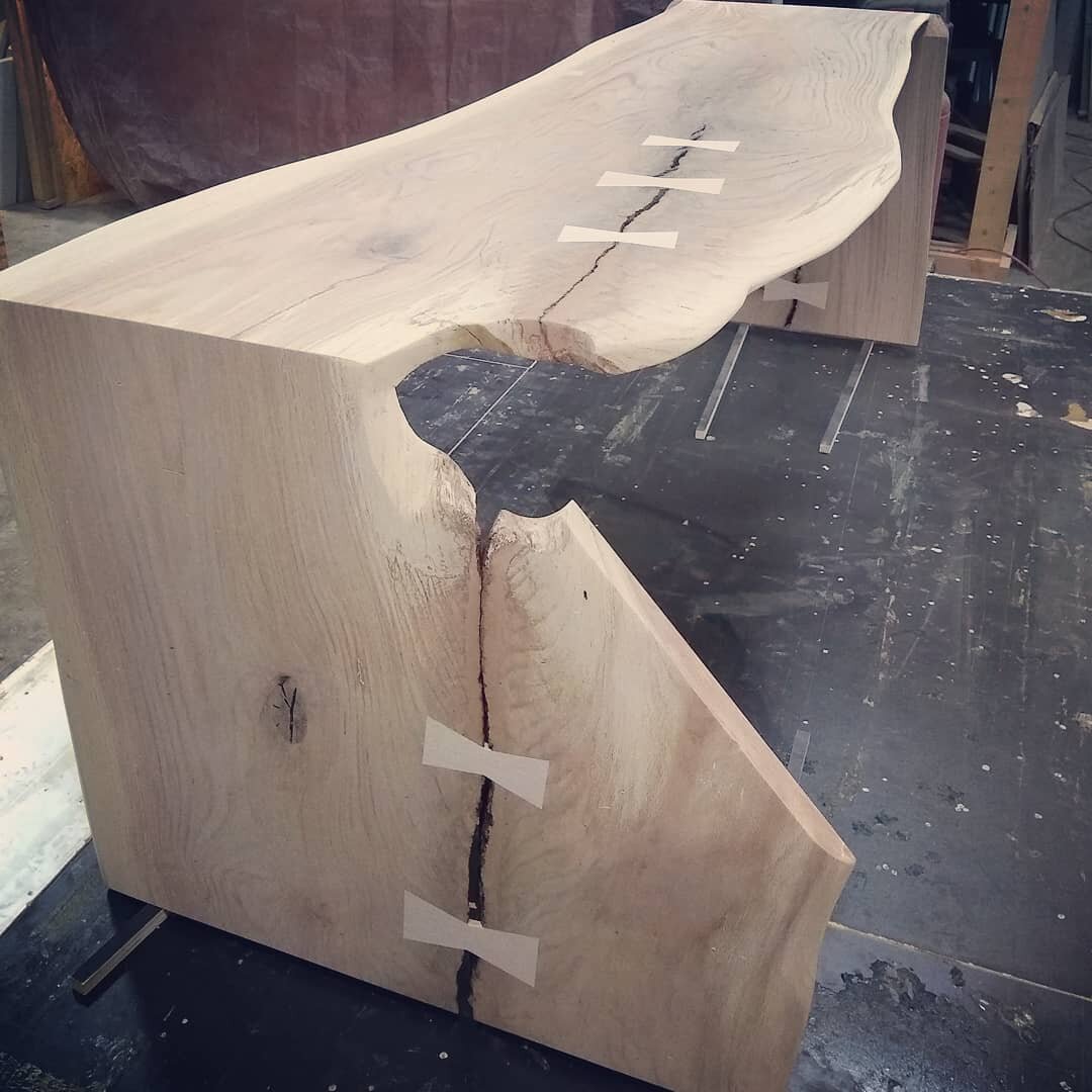 Stay tuned for more shots of this mirrored waterfall desk. The slabs came from a piece of property next to #piedmontpark.  Oak with maple ties.  #urbantimber #slabdesk #coolfurniture