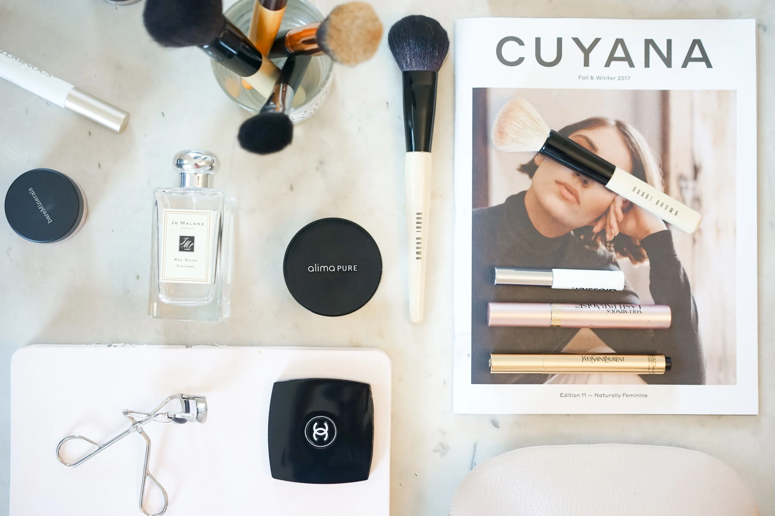 capsule_makeup_glossier_boy_brow_alima_pure_satin_matte_foundation_jo_malone_red_roses_bareminerals_guerlain_bronzer.jpg