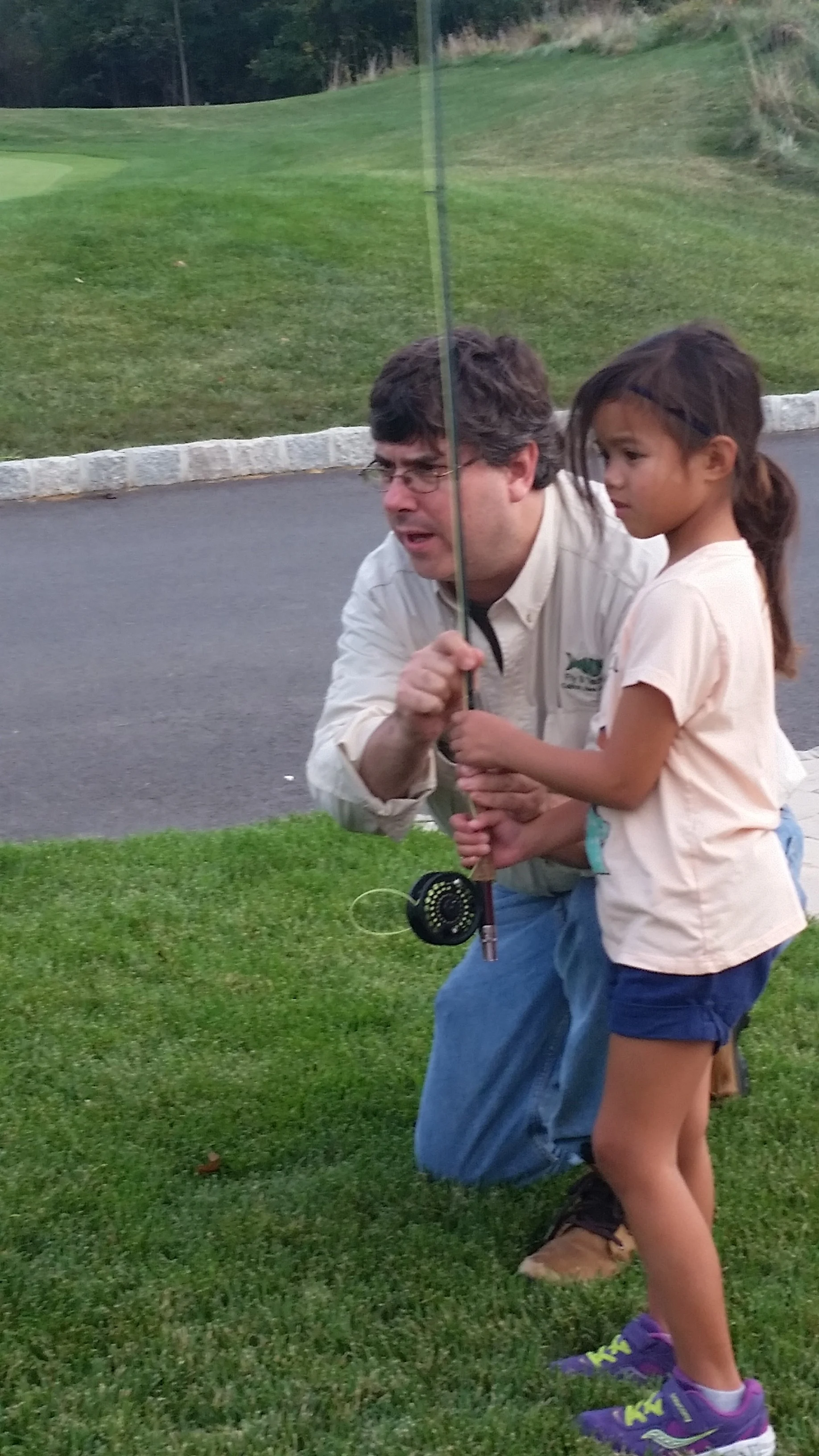 Jim Holland patiently teaches the art of fly casting