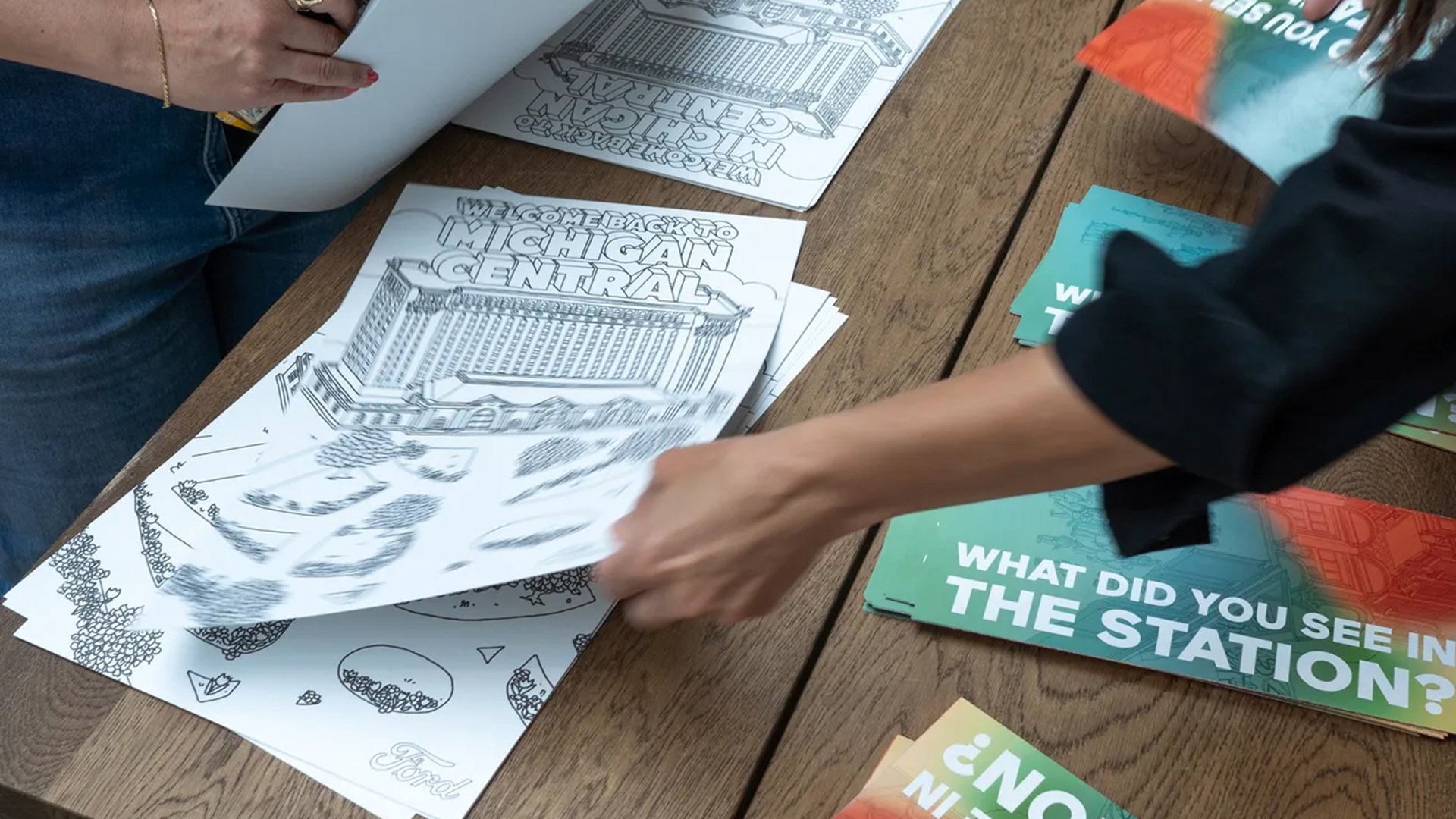And the same local artist created a coloring poster in the same style as the vintage Michigan Central memorabilia.