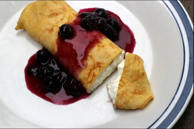 Cheese Blintzes with Blueberry Sauce