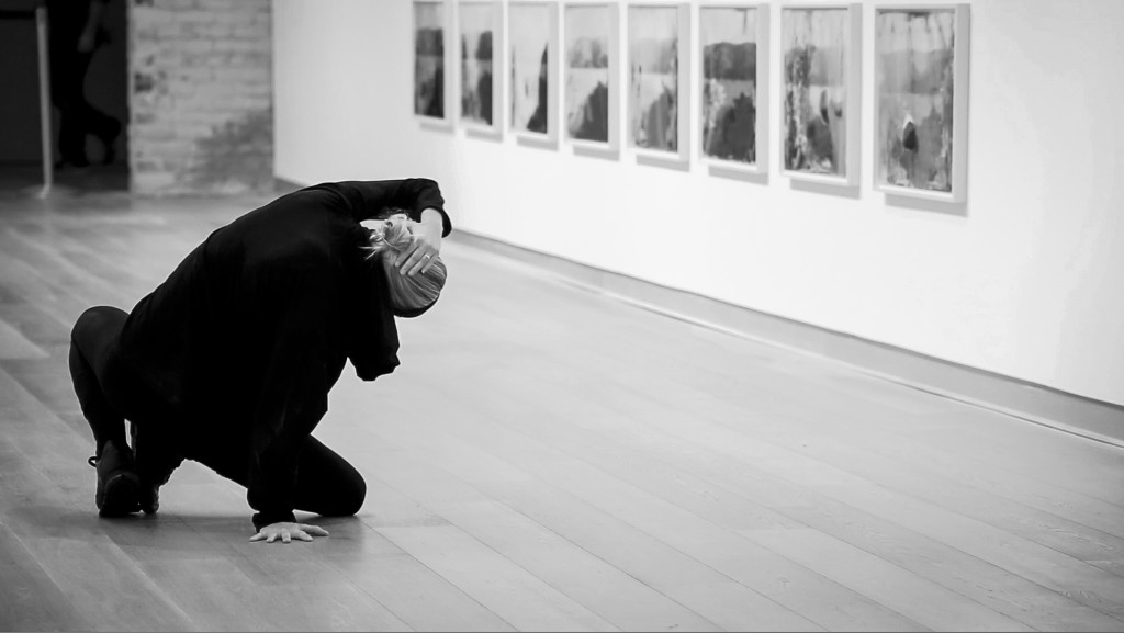 Lilja Rúriksdóttir, one of the performers, making her way across the gallery in smooth, measured movements.
