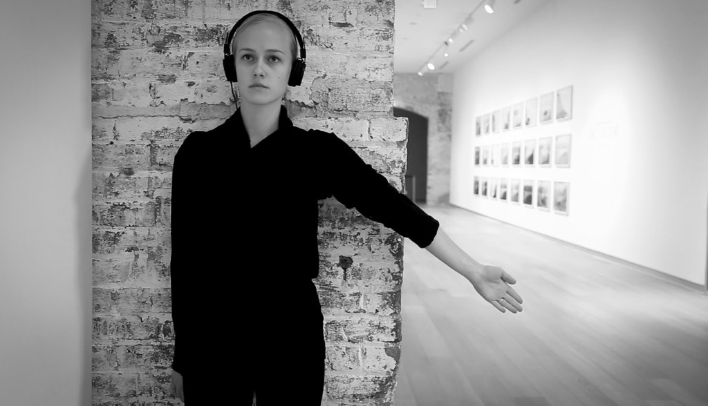 Lilja stopping at one of the original brick archways in the SCAD Museum of Art. The dancers would observe the brick through touch, running their fingers and bodies along each arch.