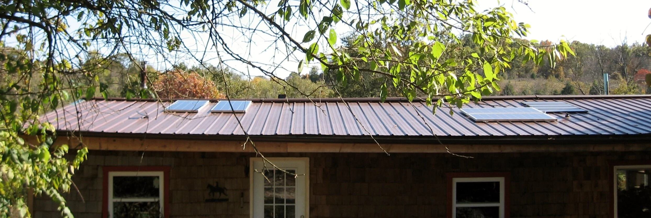 Metal Versus Shingle Roof For Your Off Grid Cabin