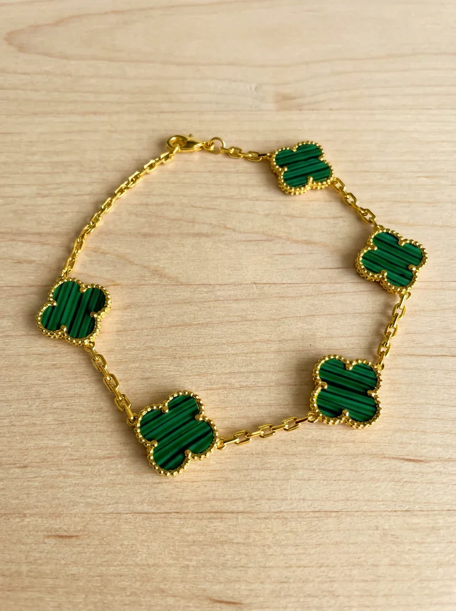 clovermalachitegoldbracelet_1a9aded4-4ddb-4123-b00a-8c5ccb7a9e5a_896x.webp
