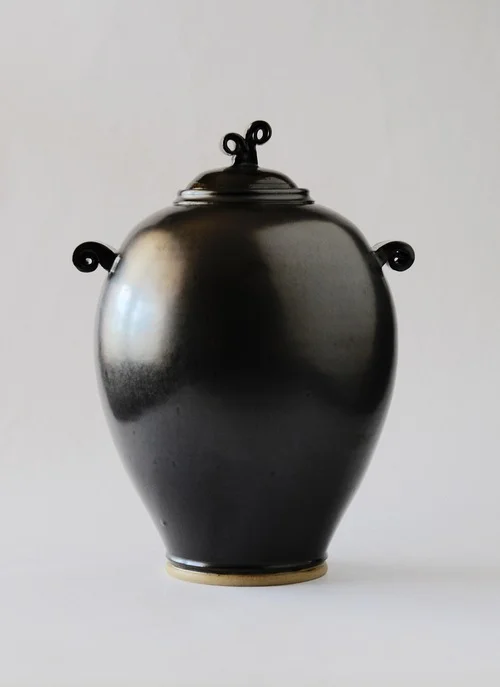12and+34+inch+stoneware+lidded+vessel+with+metalic+black+glaze.jpg